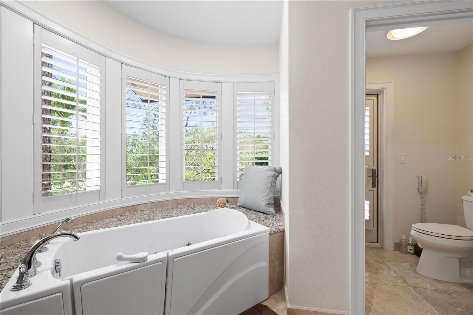 Master bathroom with stand up shower & double vanity.
