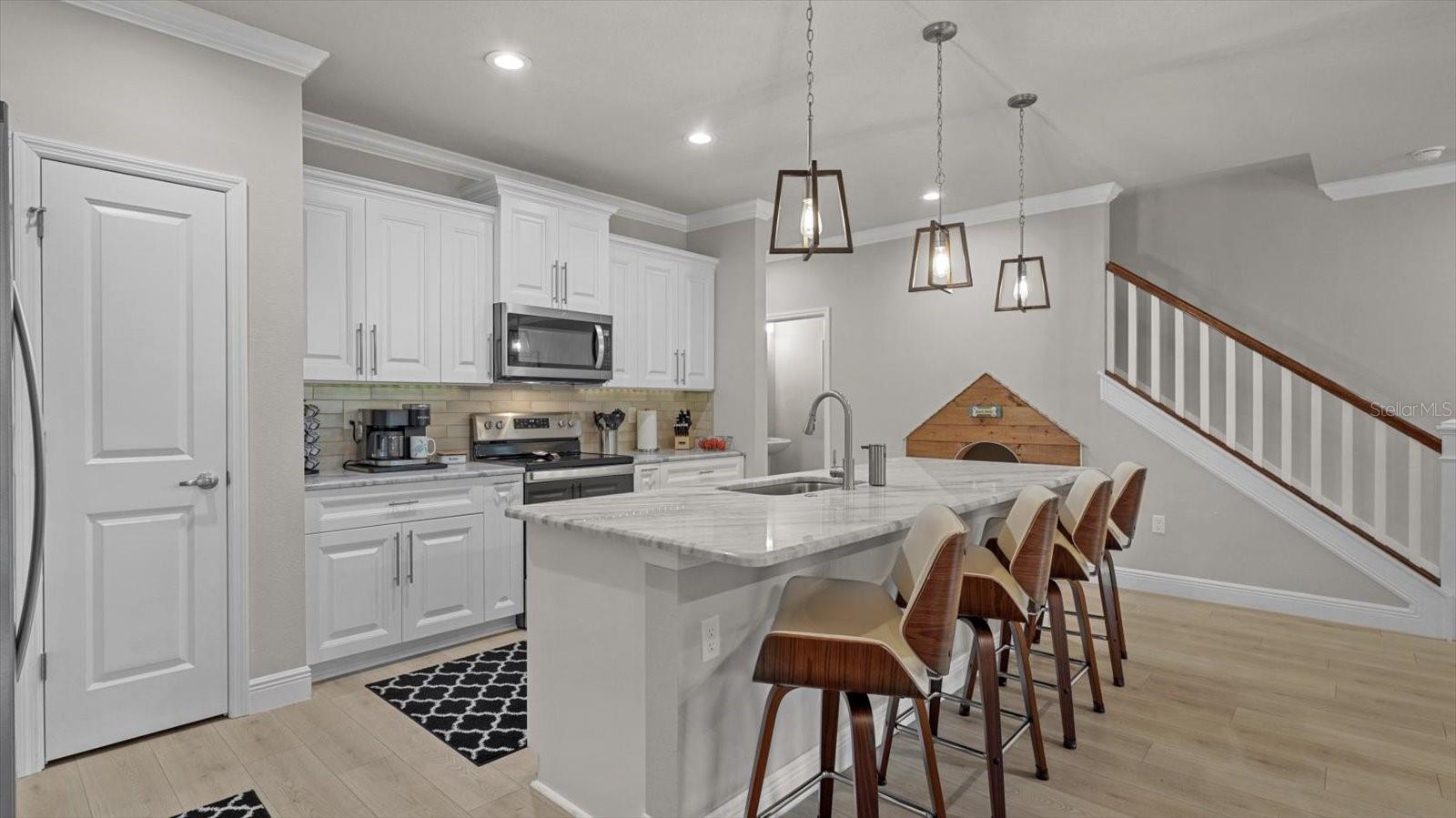 Step into your gourmet kitchen with a spacious island.