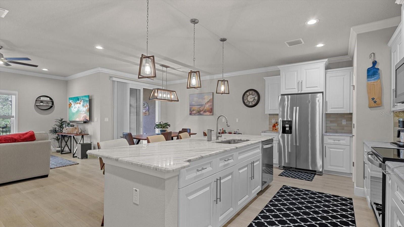 kitchen is open to the family room & dining room