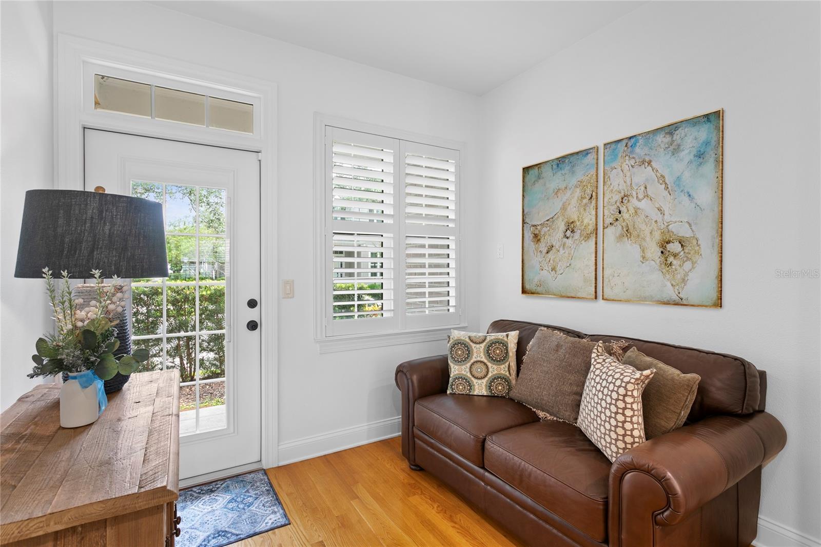There's room in the kitchen for an informal dining spot or even a small sofa, just like the owners are using it now, which leads out to....