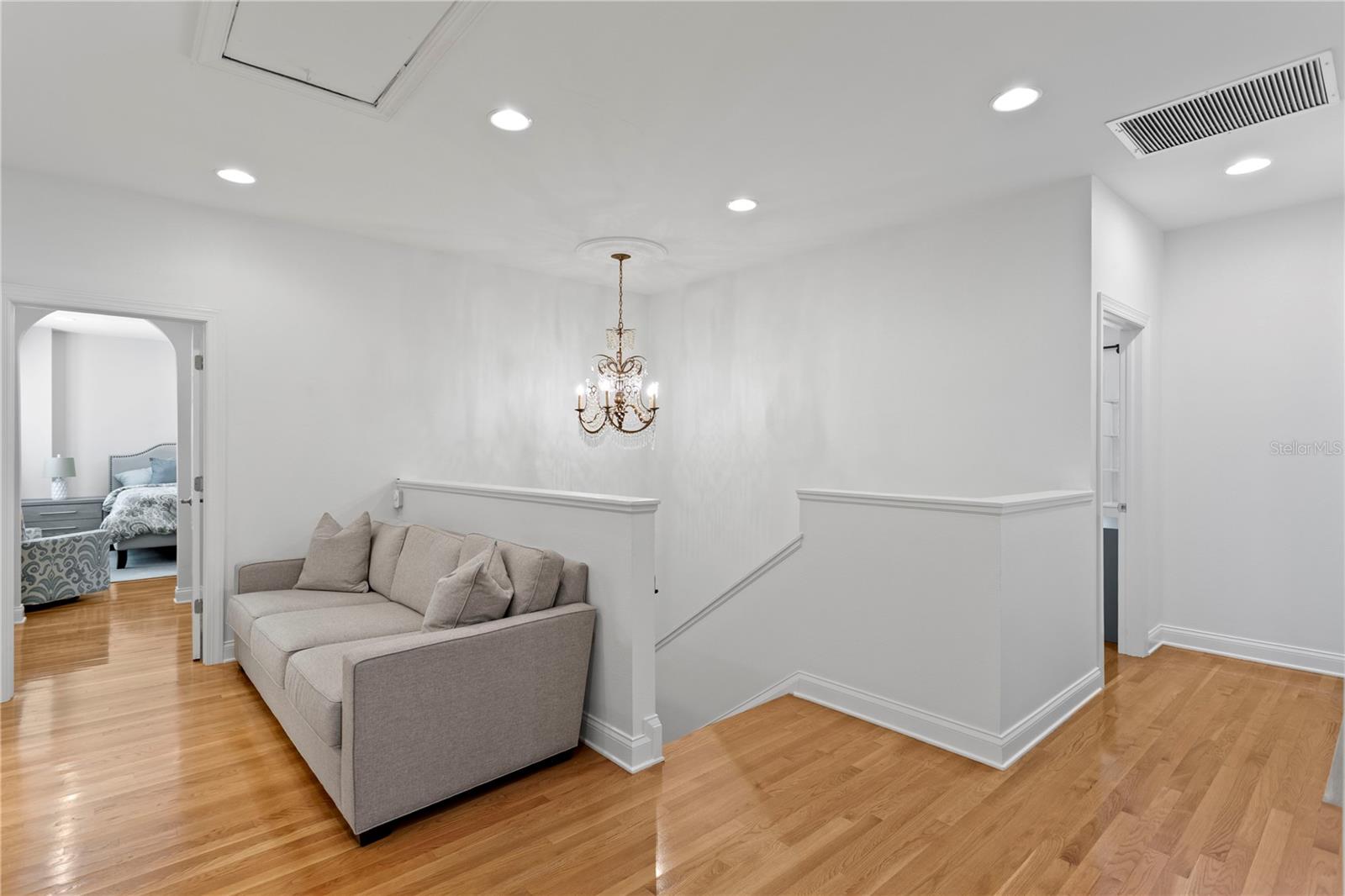 Upstairs features a spacious landing with room for a cozy sitting area.