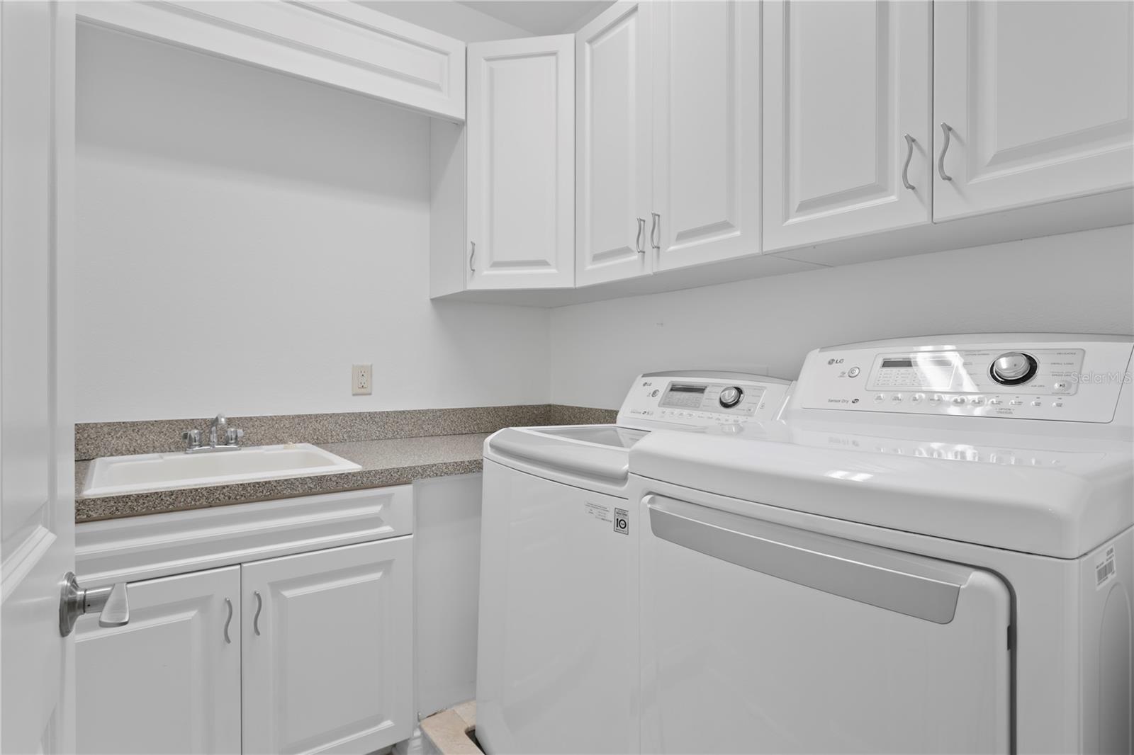 With the laundry room just steps from all the bedrooms, hauling laundry is quick and easy