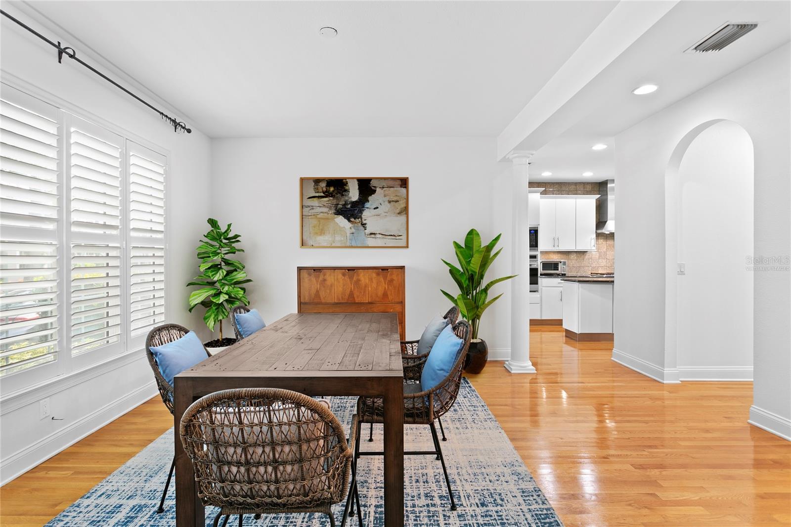 Virtually staged photo of the accessories within the inviting dining room