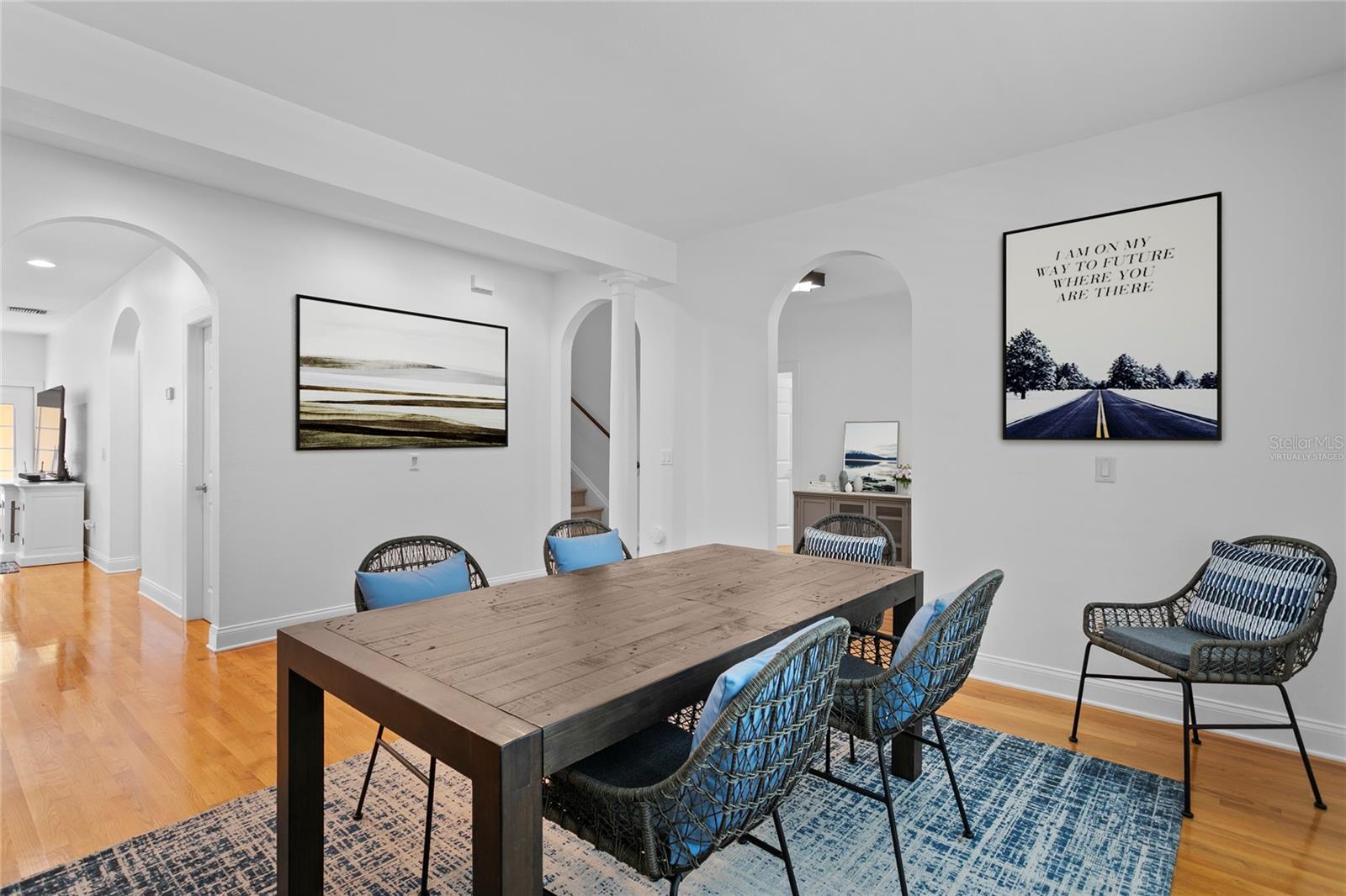 Virtually staged photo of the accessories within the inviting dining room