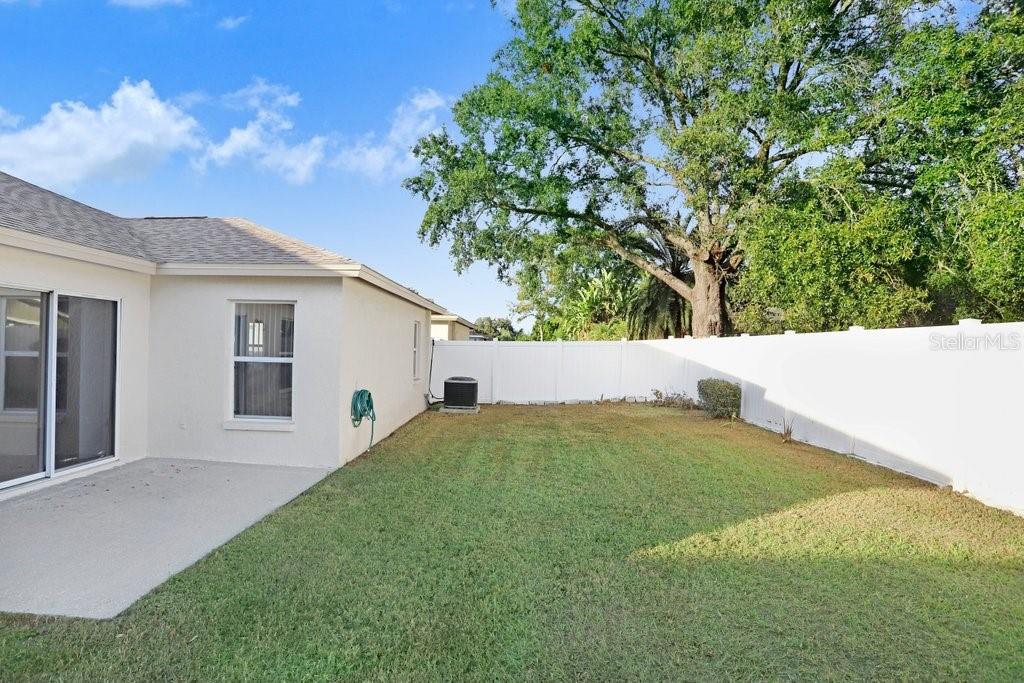 Private fenced backyard