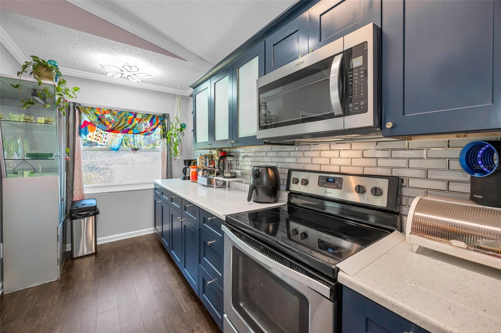 Kitchen with stone counters and Stainless Appliances