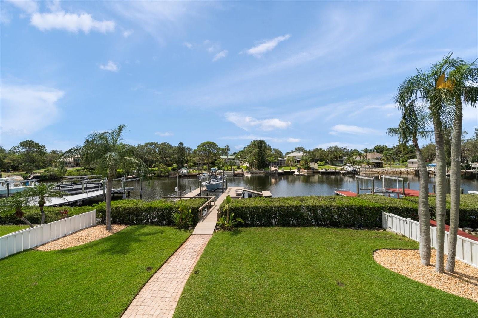 Backyard with Walkway to Dock/Lift