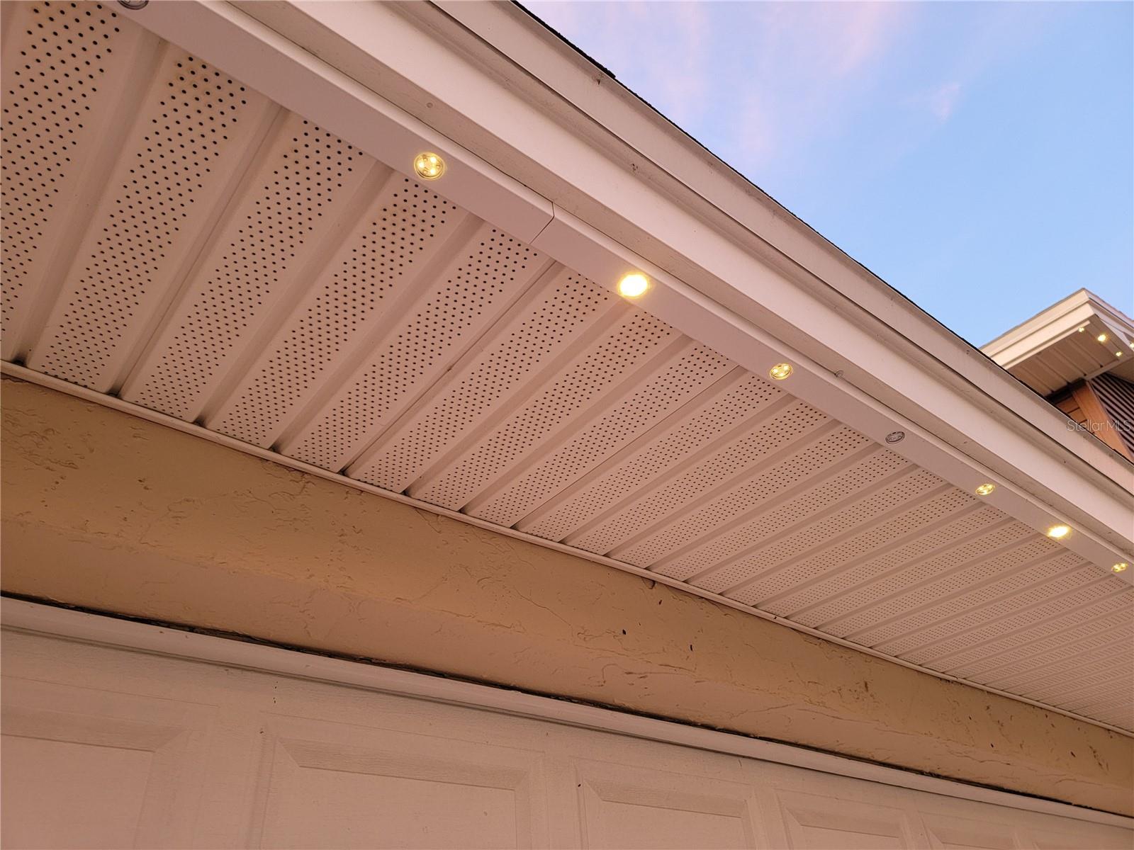 Decorative automatic lighting around front perimeter of home.
