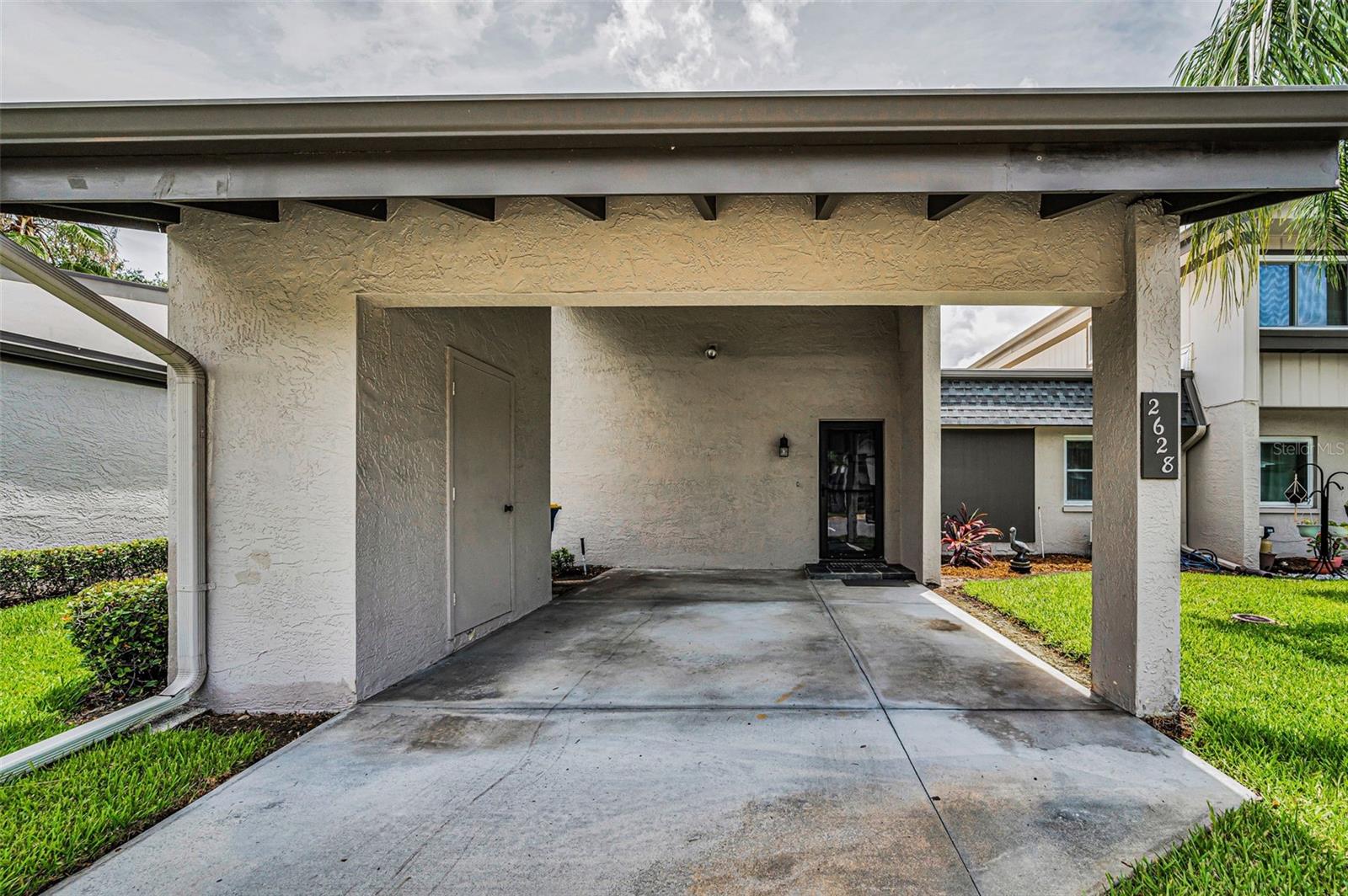 Covered Carport & Storage Closet