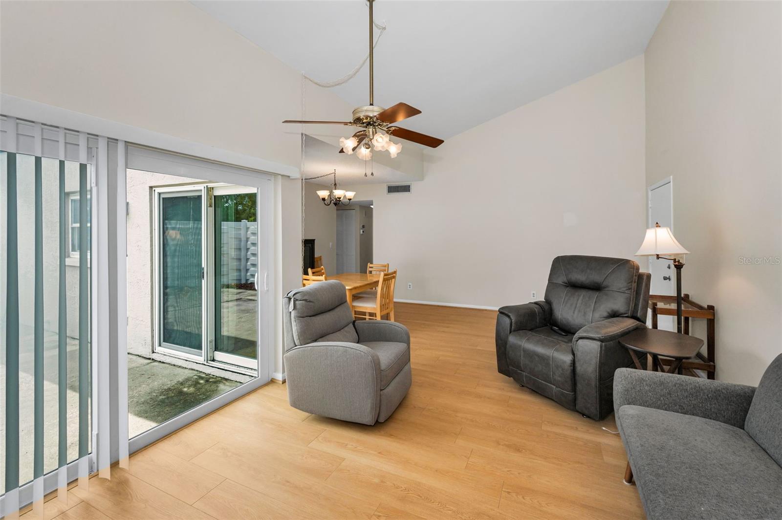 Living Room - High Ceilings - Sliders to the patio