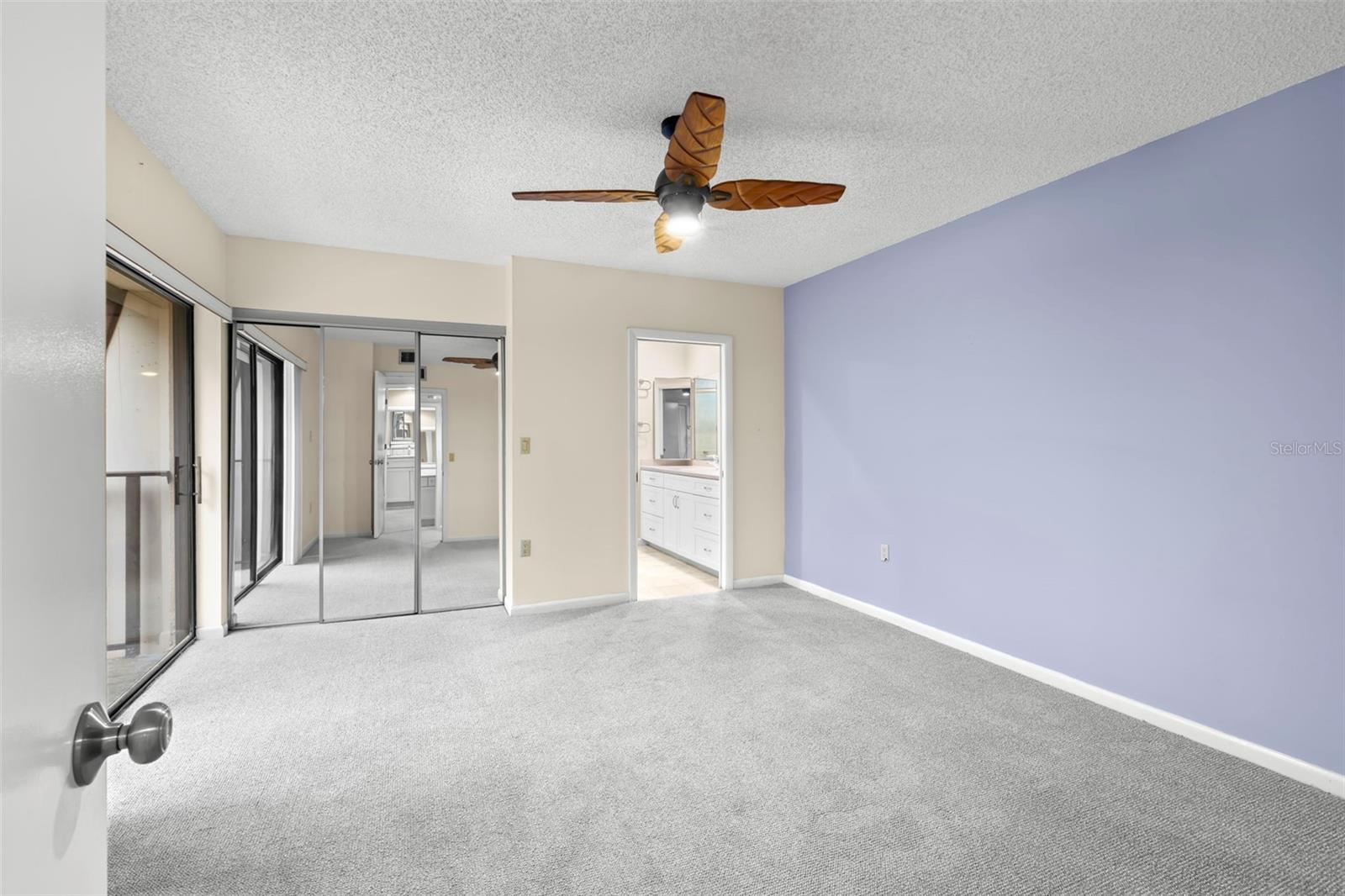 Primary Suite with ensuite, walk in closet and private balcony