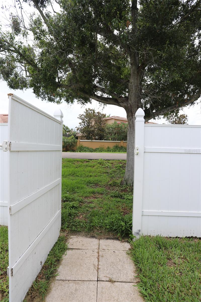 Gate from rear yard to Pinellas Trail