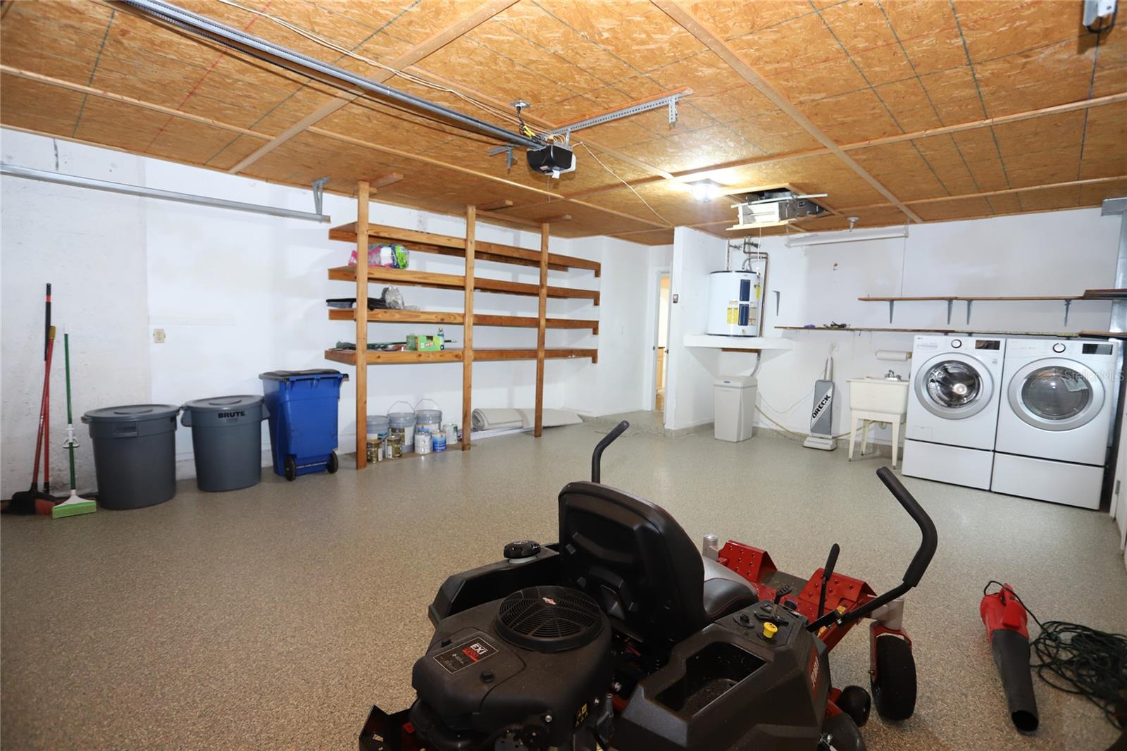 Garage With Epoxy Floor Attic Access