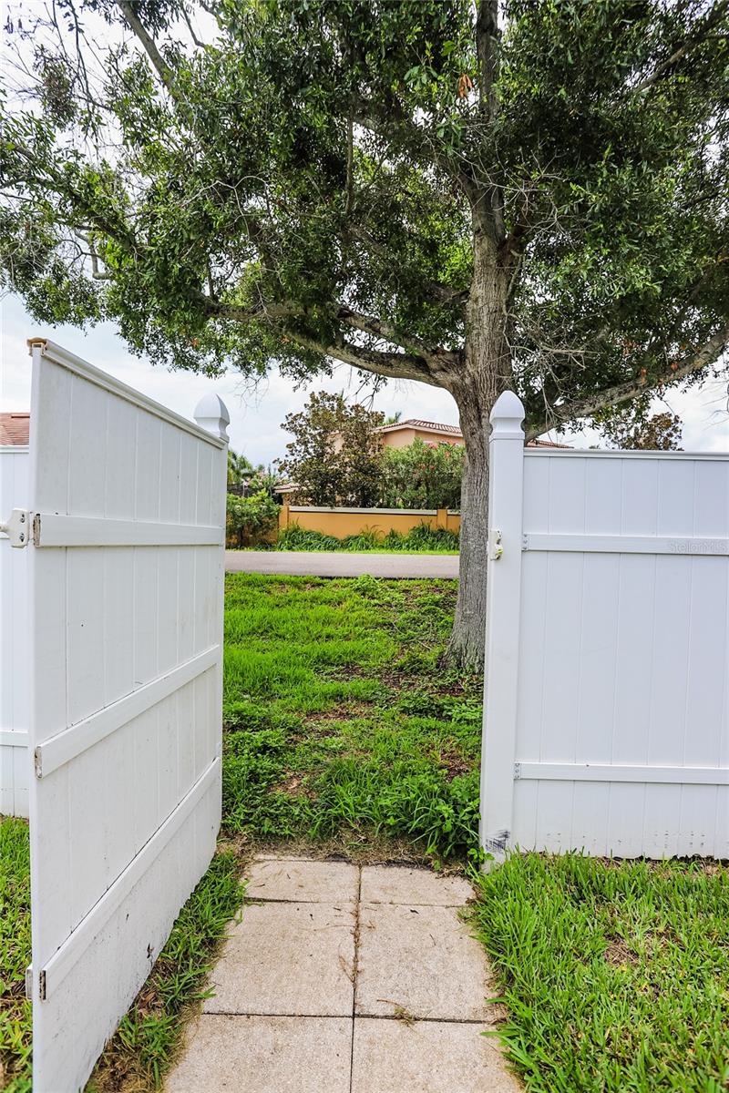 Back gate opens to Pinellas Trail