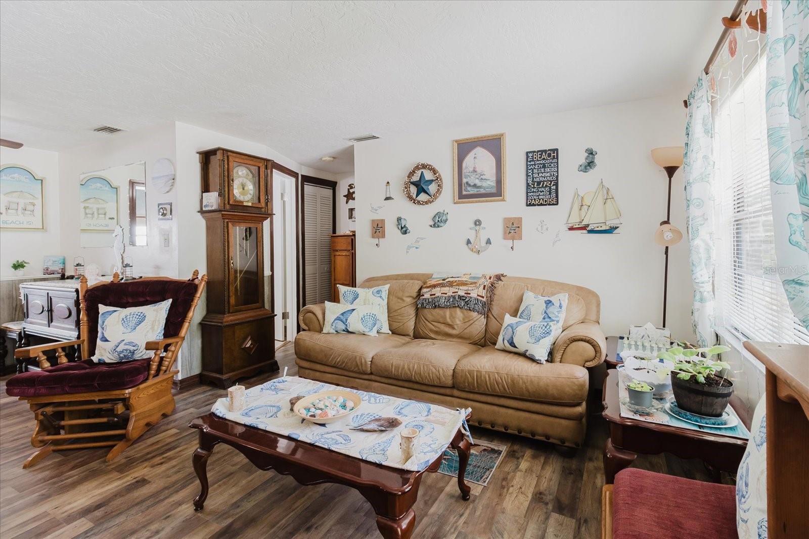 View of Living Room From The Front Door. New Luxury Vinyl Floors in May 2025.