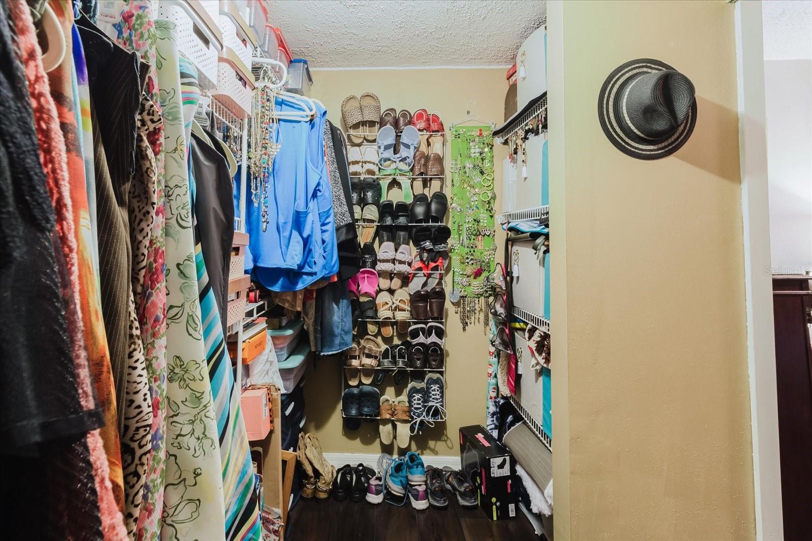 Primary Bedroom Walk In Closet 1