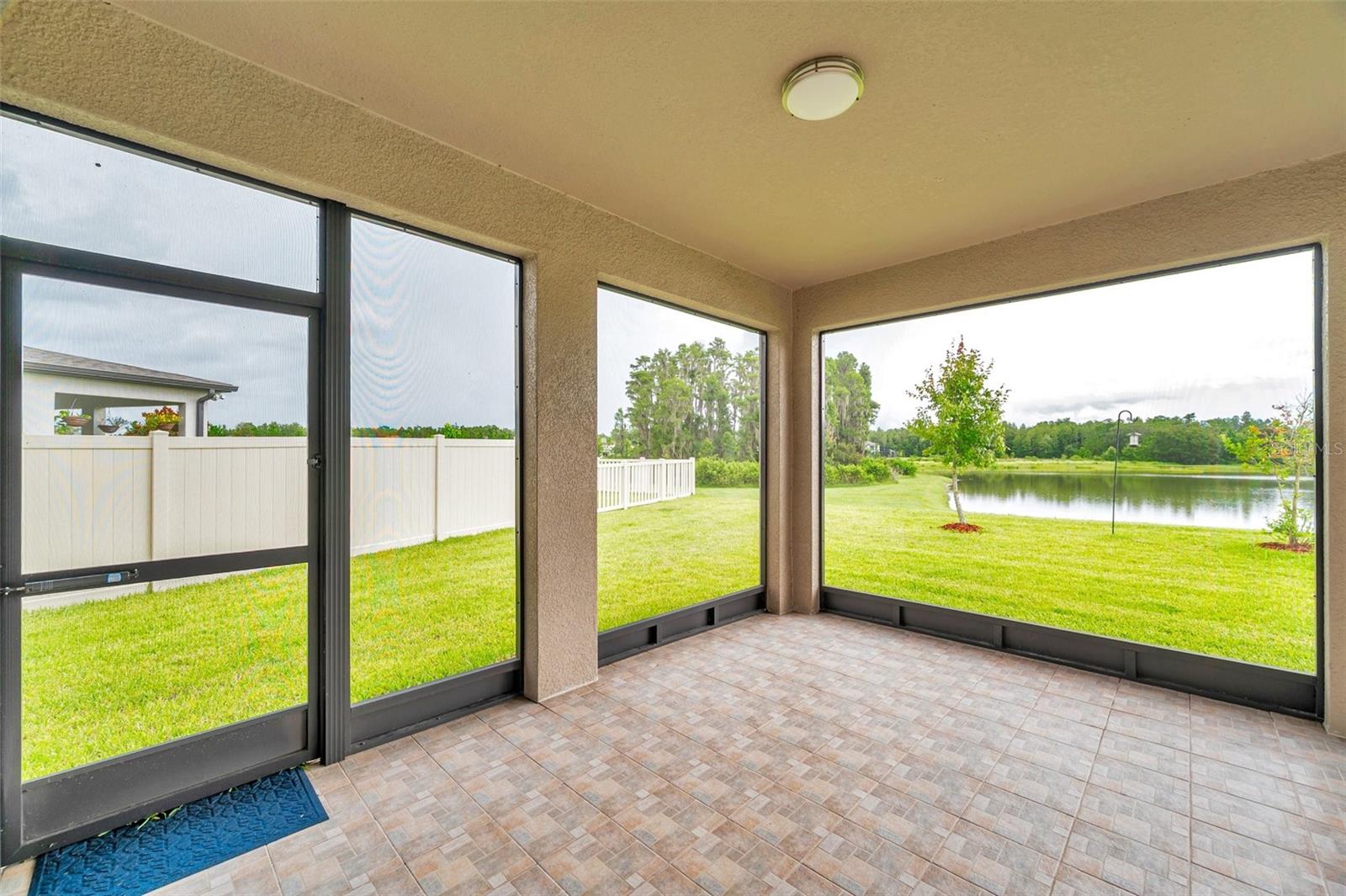 large, screened patio with water view