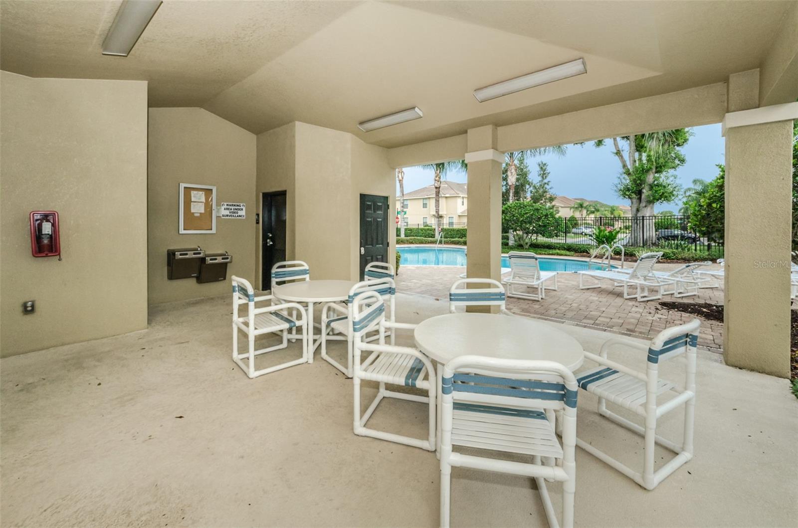 Covered outdoor patio pool area