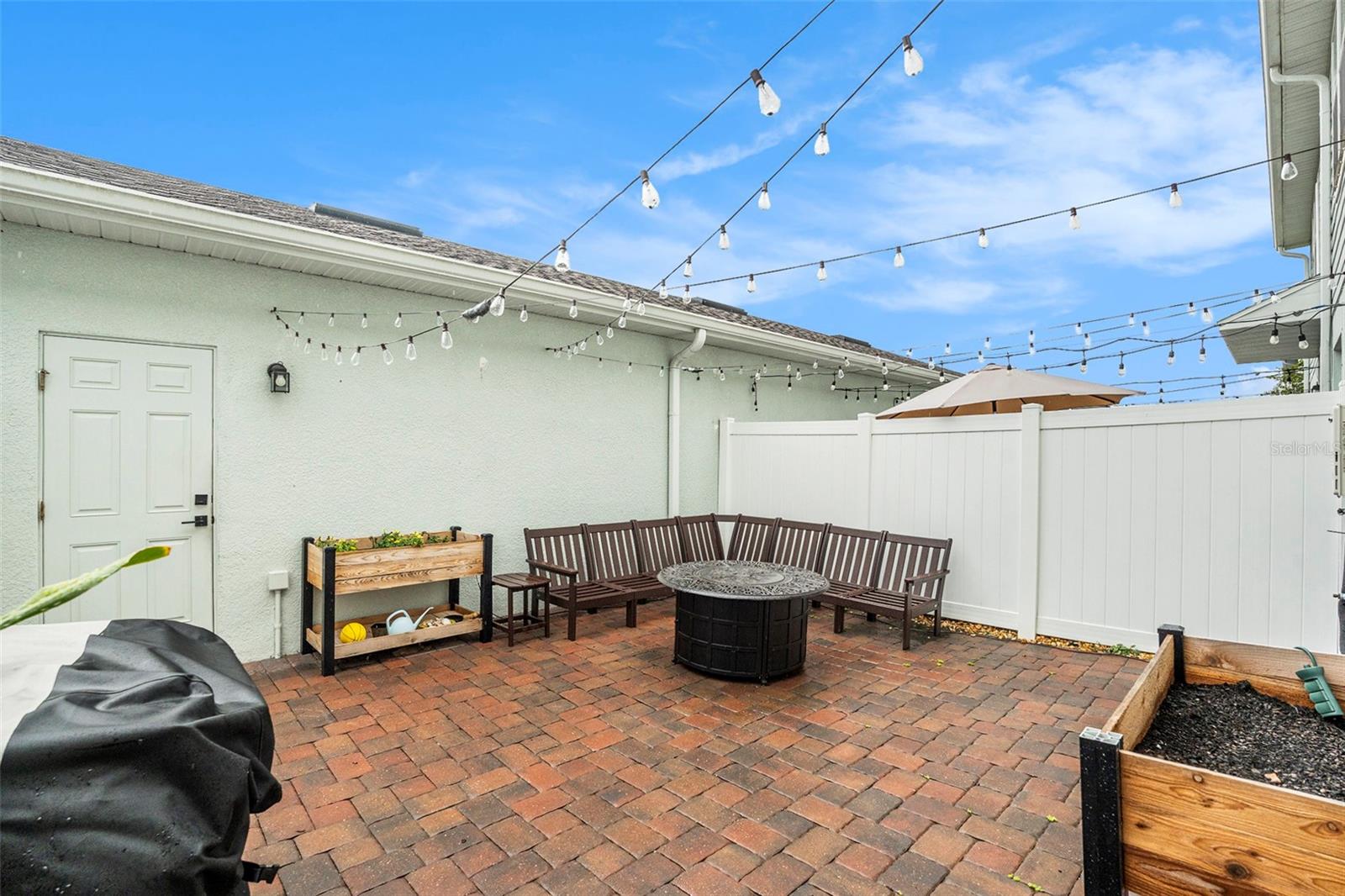 Private Patio & Entrance to Garage
