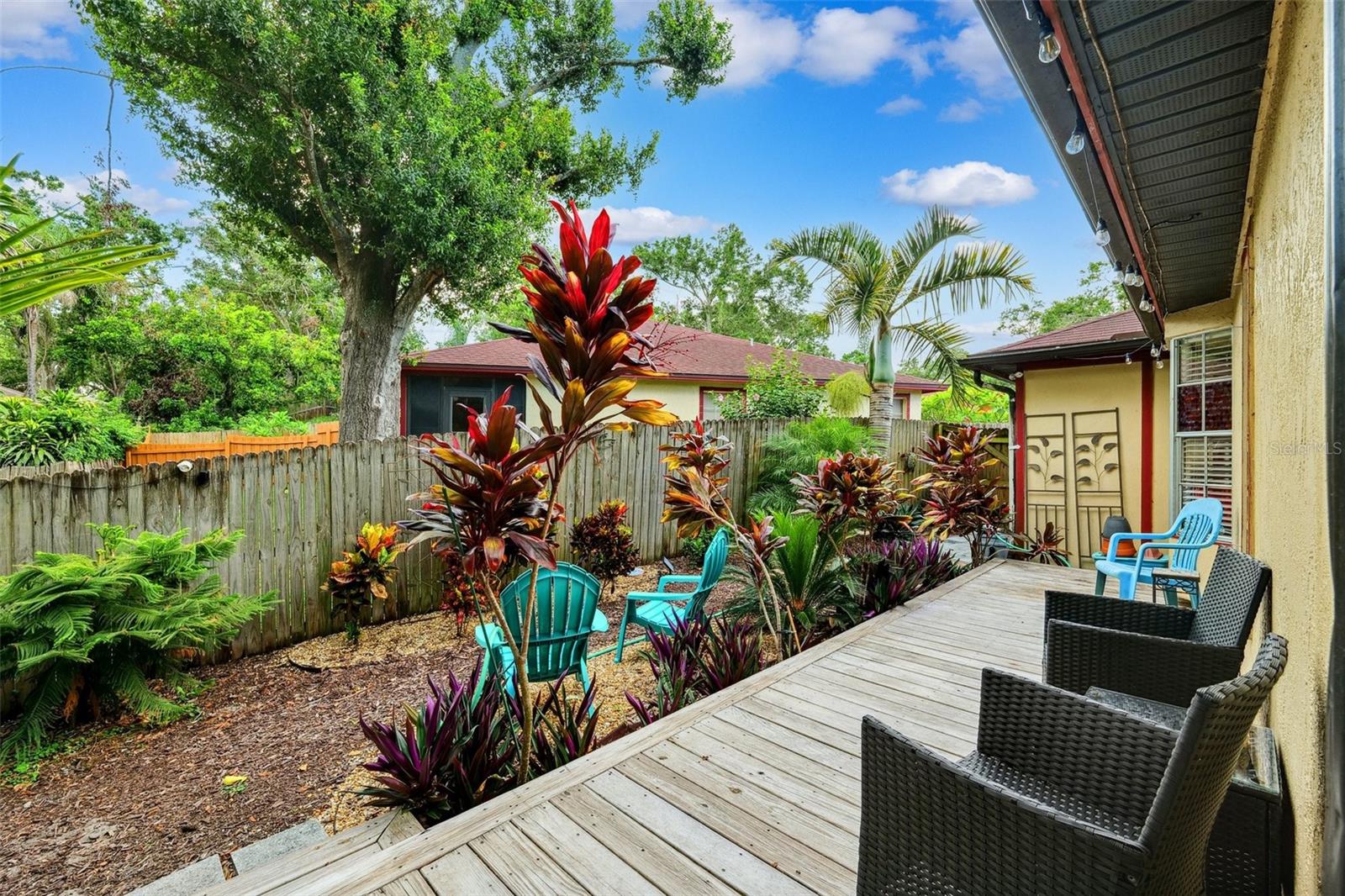 Huge wrap around deck with gorgeous landscaping
