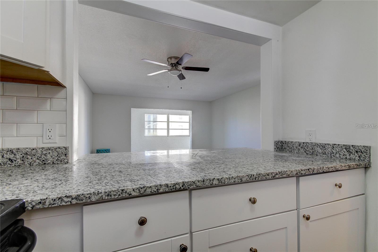 open view to living room and Florida room