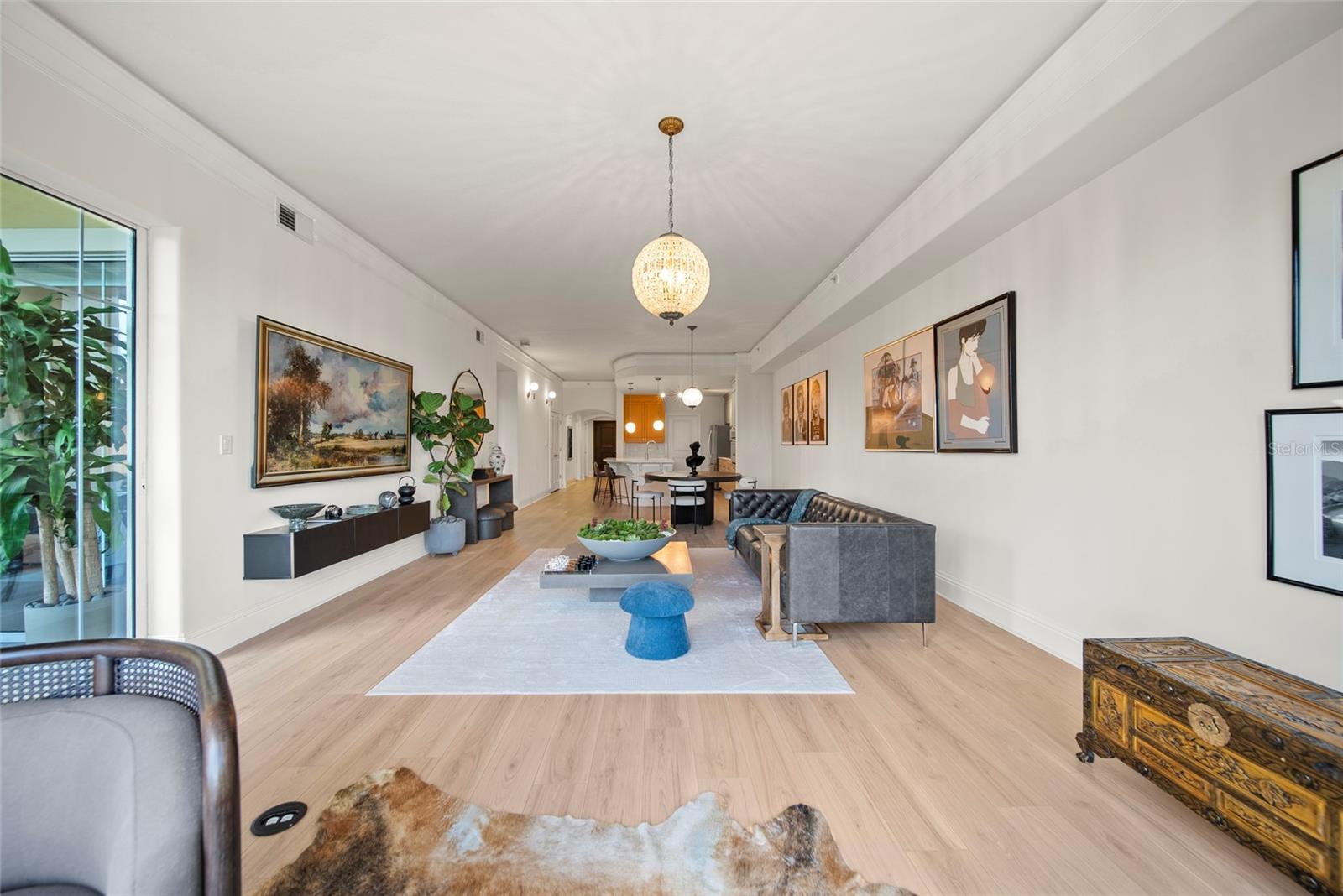 Crown Molding Throughout Living Space and Kitchen