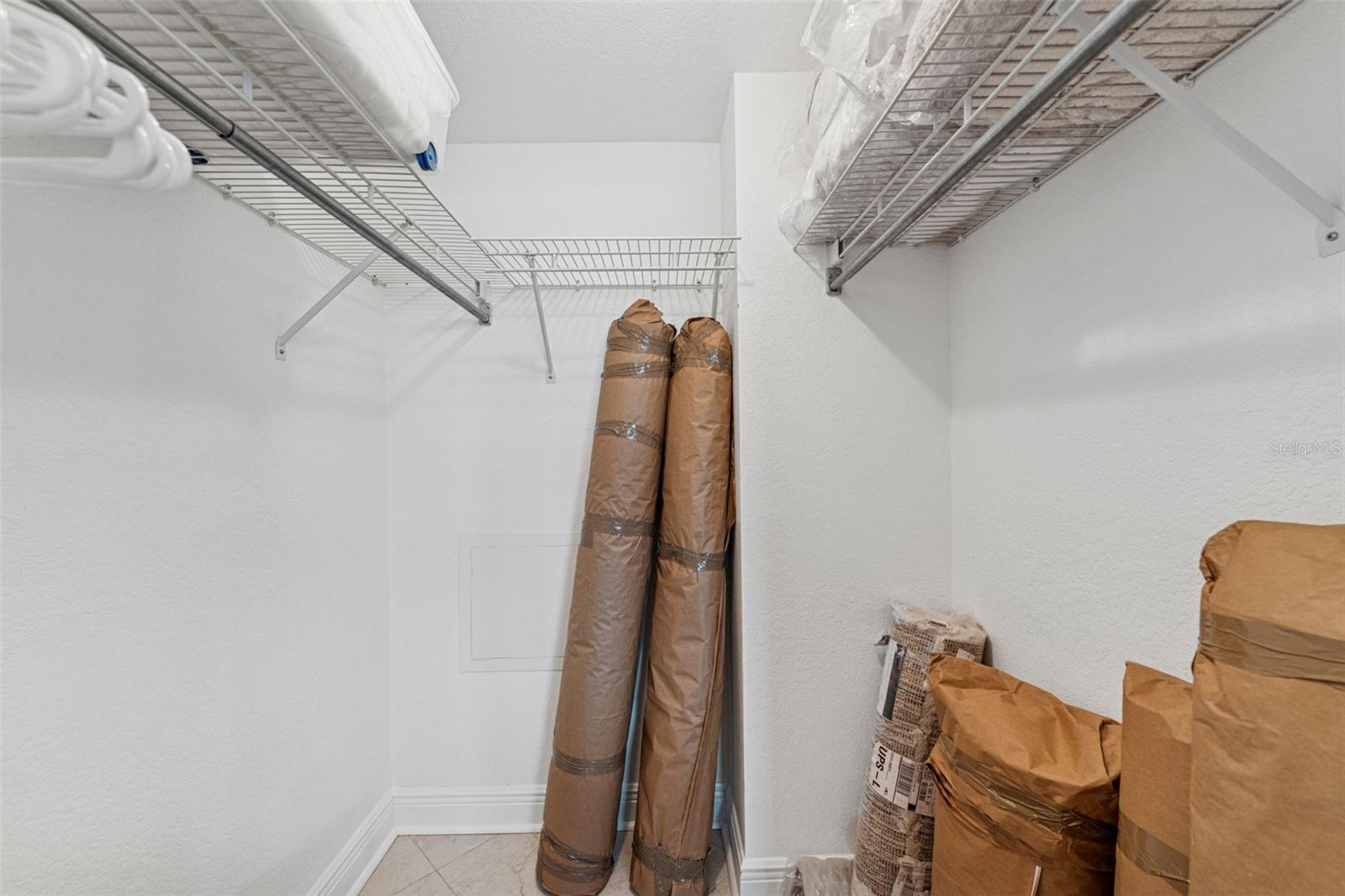 Walk-In Closet with Freshly Cleaned Area Rugs