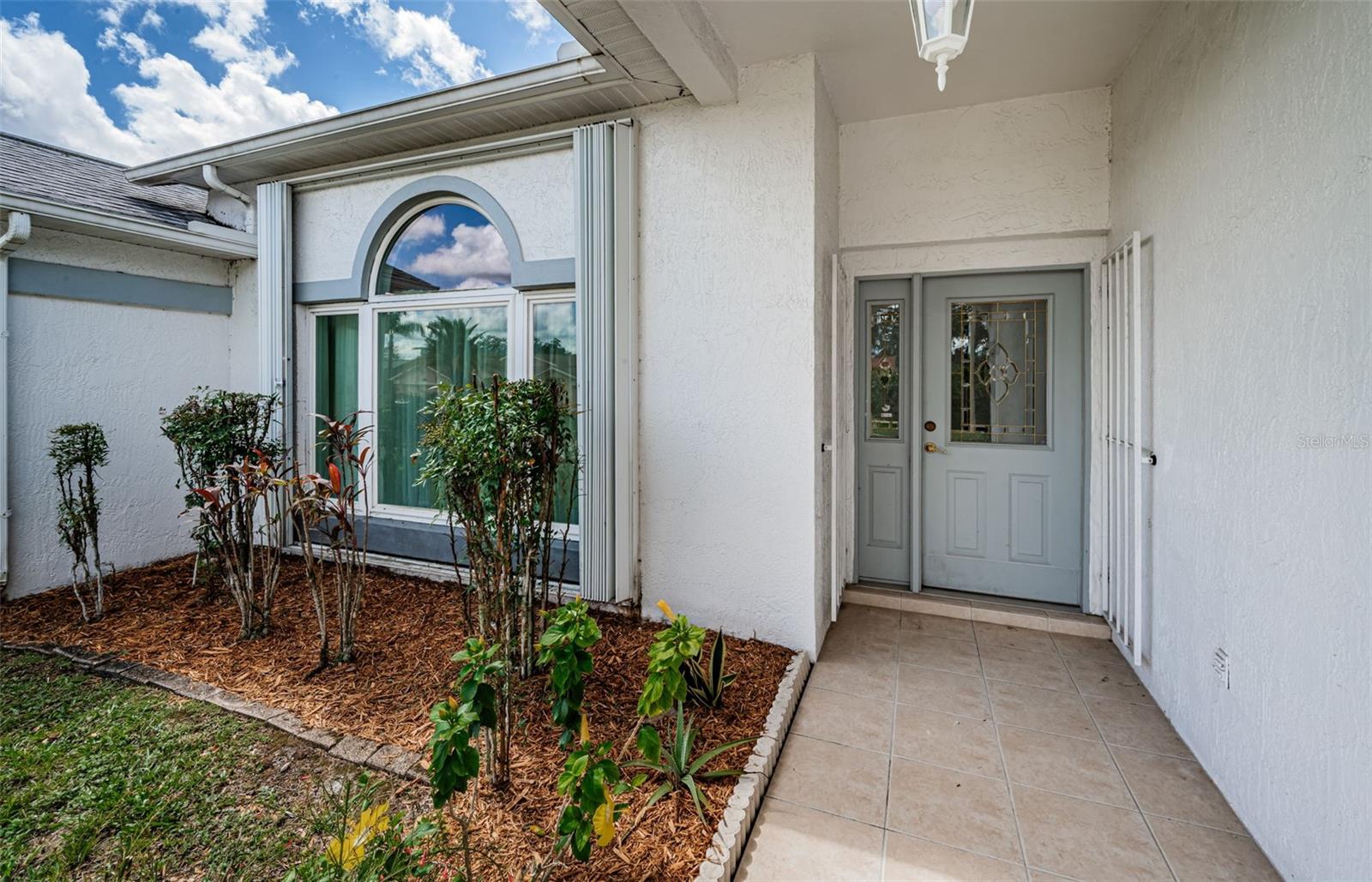 Front Door - Tile walkway in