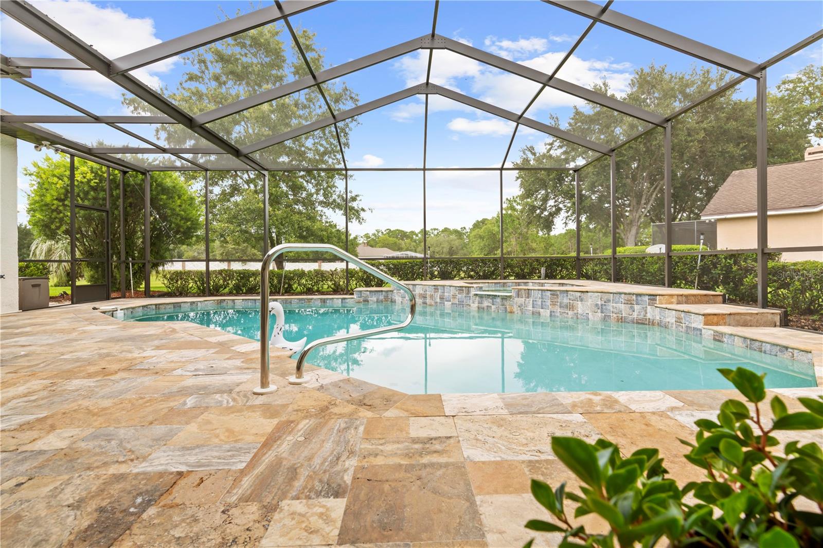 Travertine Pavers & Resurfaced Pool