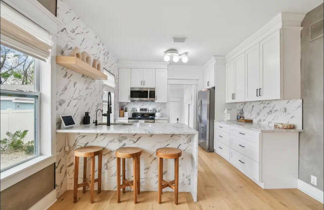 Modern Kitchen w/Waterfall Edge Island
