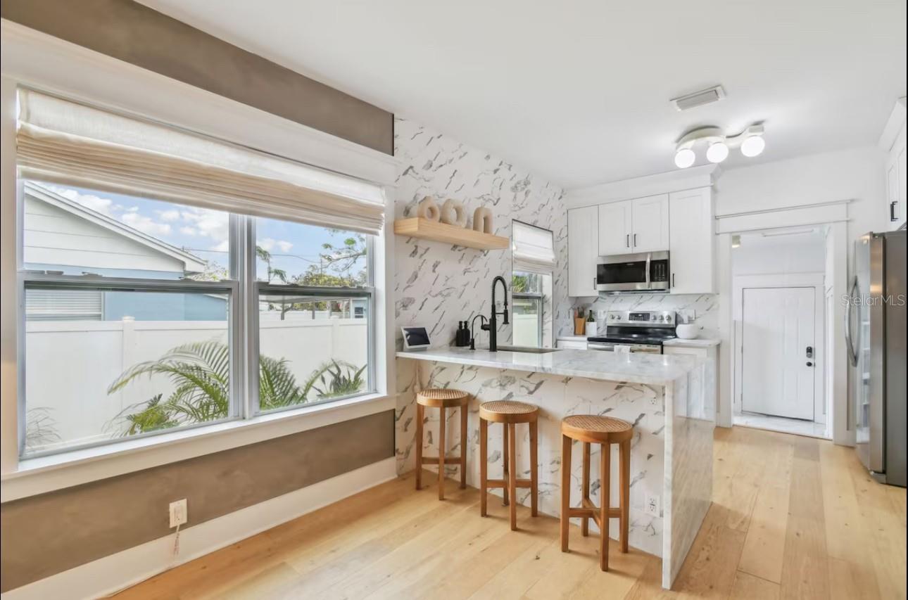 Modern Kitchen w/Waterfall Edge Island