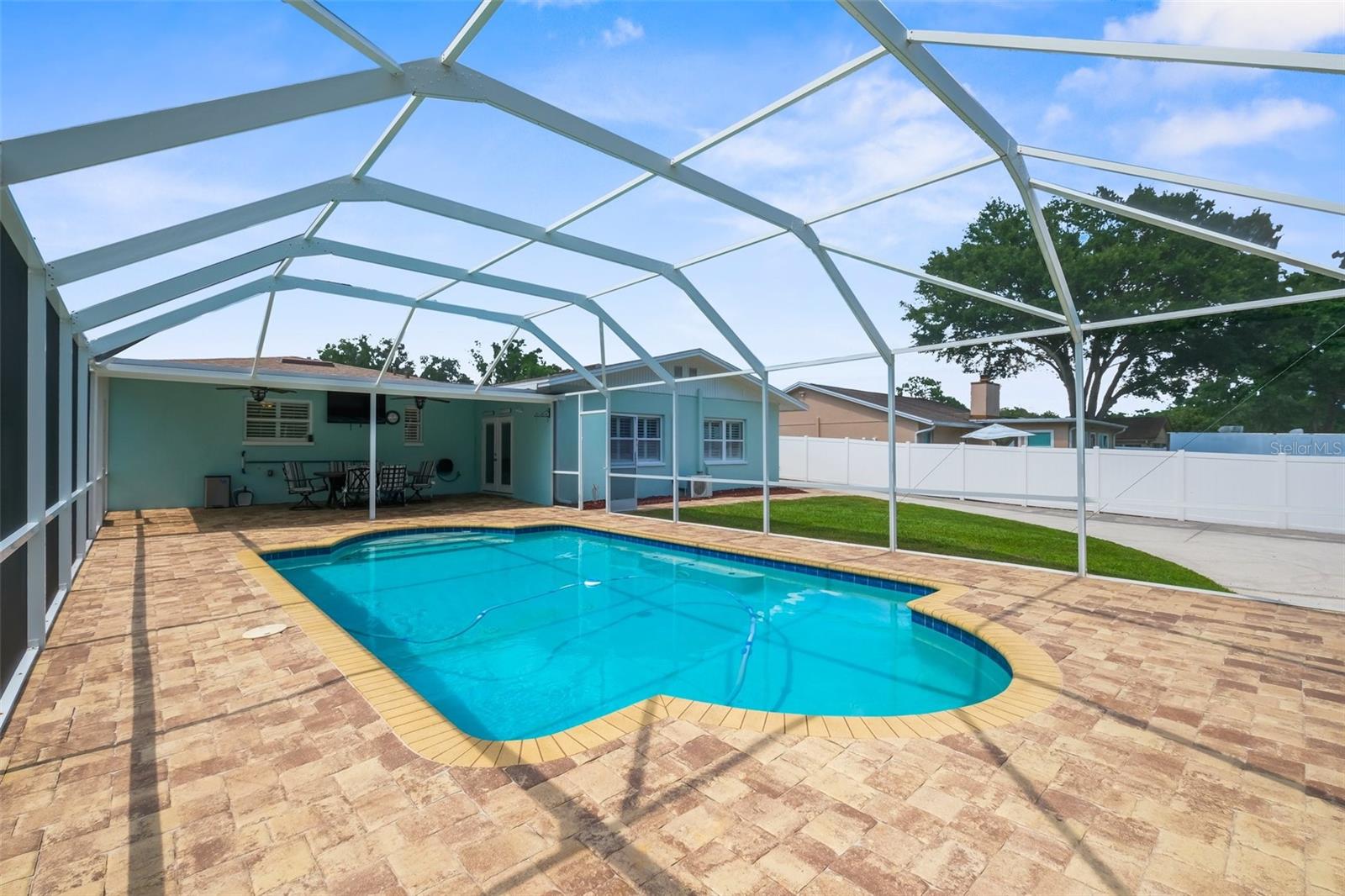 White vinyl privacy fencing gives you so much privacy in your pool and backyard!