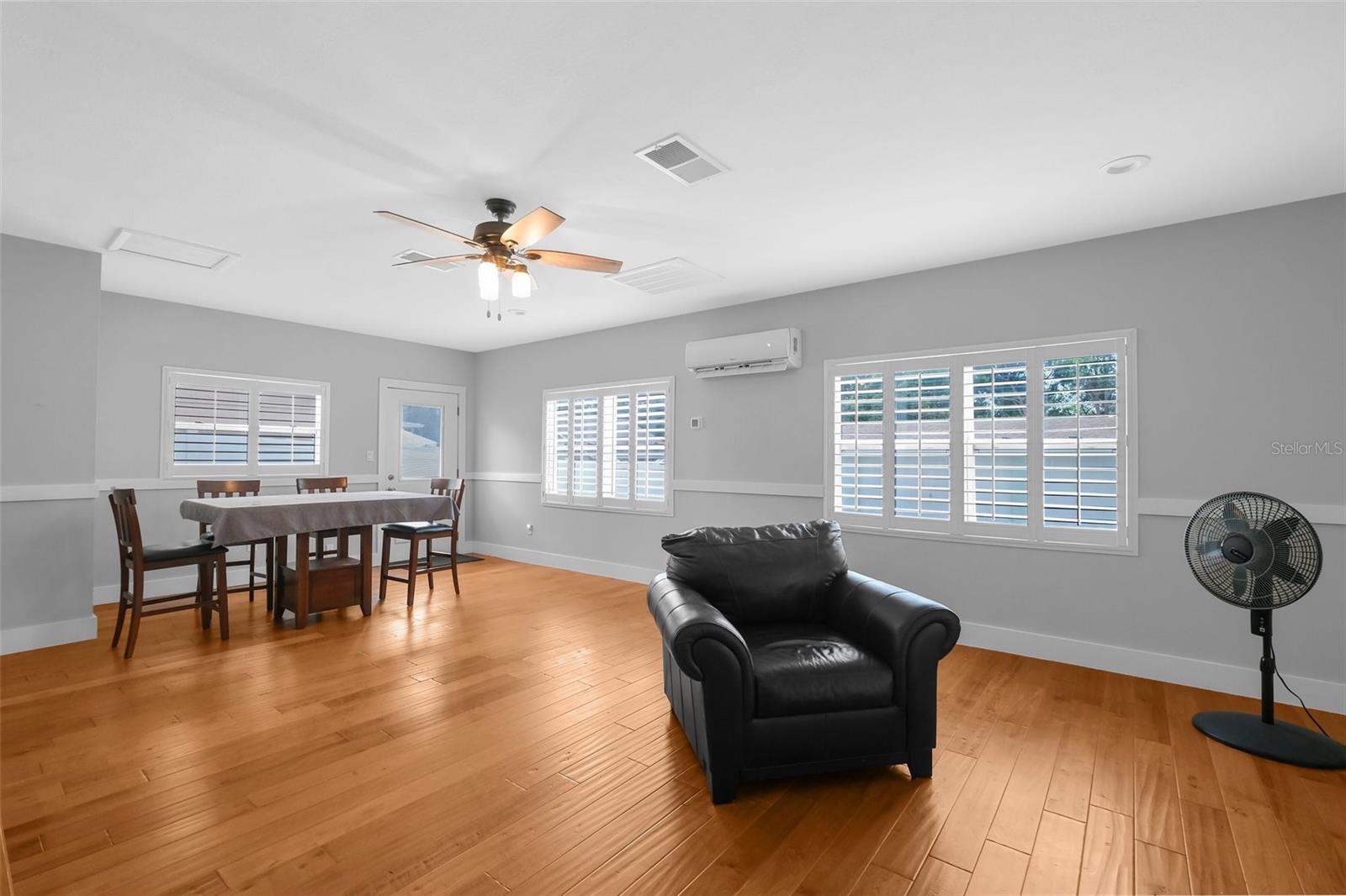 Large additional family room with french doors to the pool and extra entrance door to the outside.