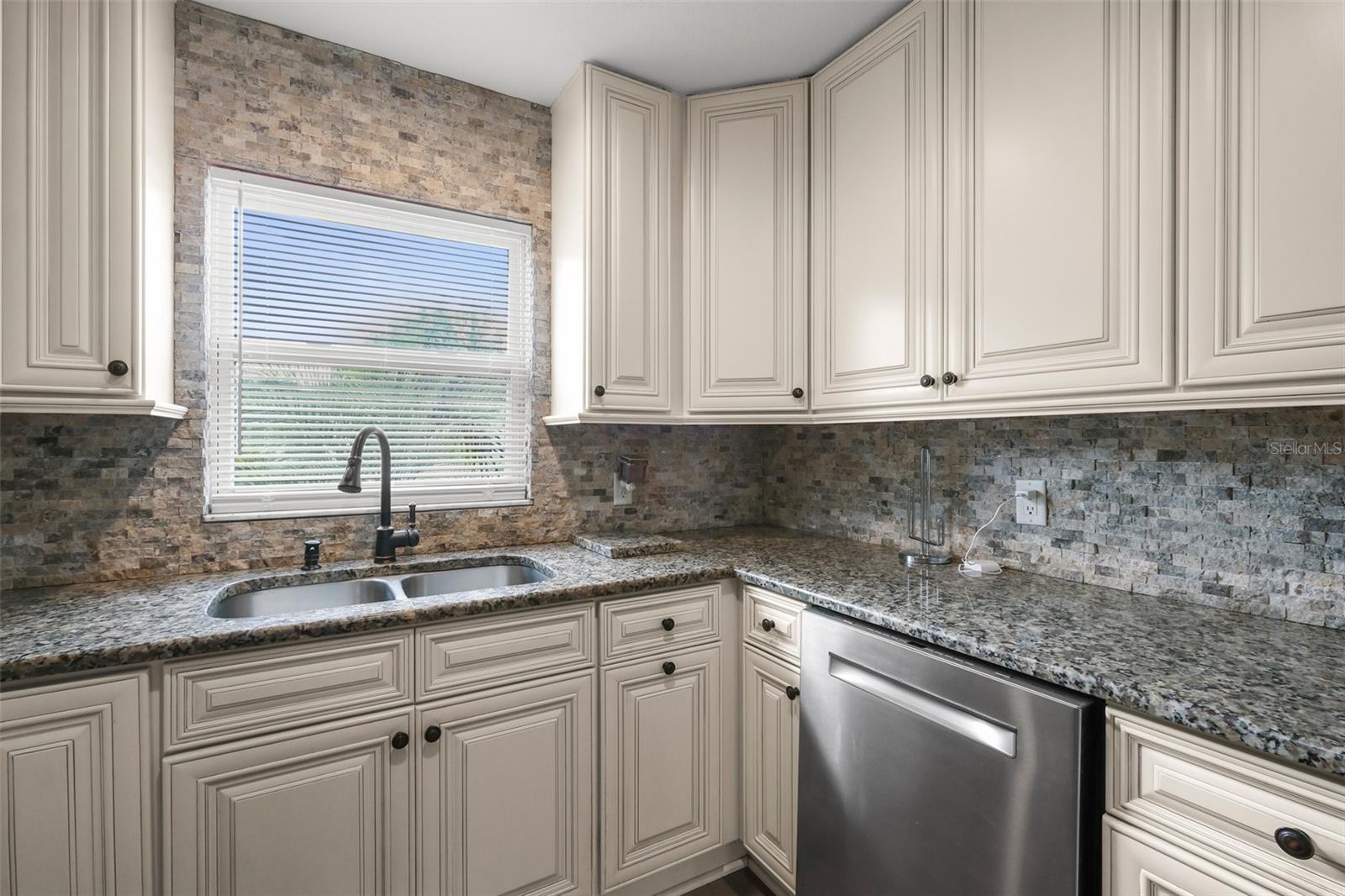 Remodeled upgraded kitchen with granite countertops.