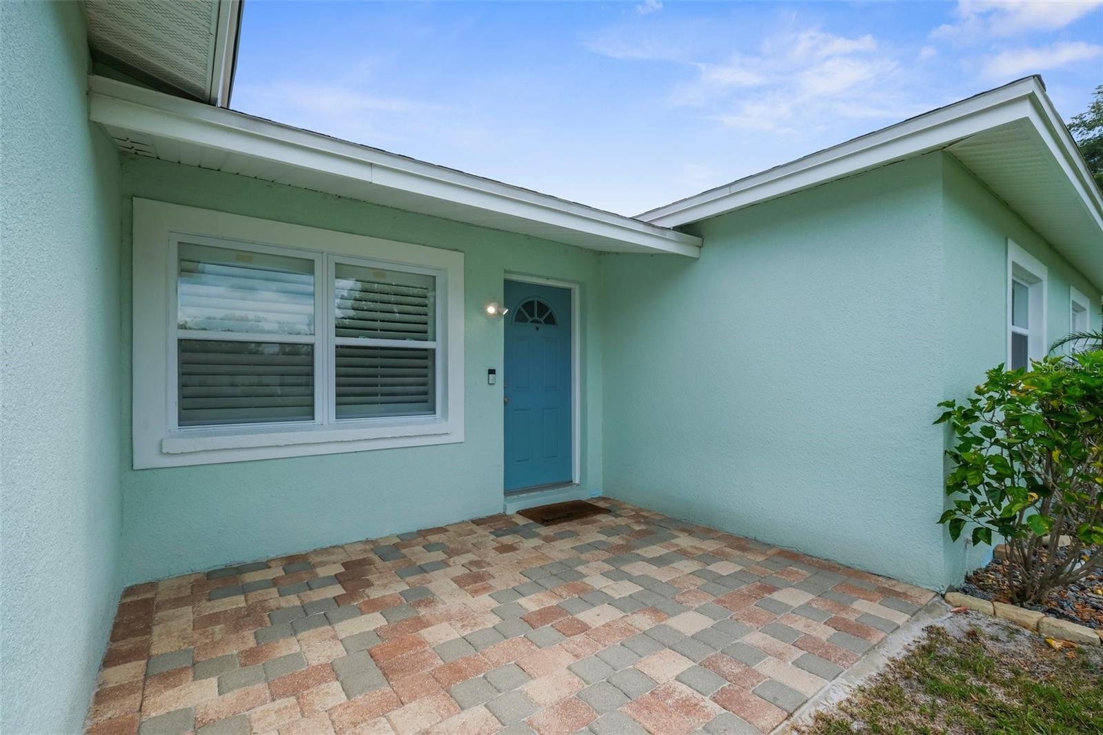 Front entrance with brick paver patio to decorate for the holidays! Greet your guests!
