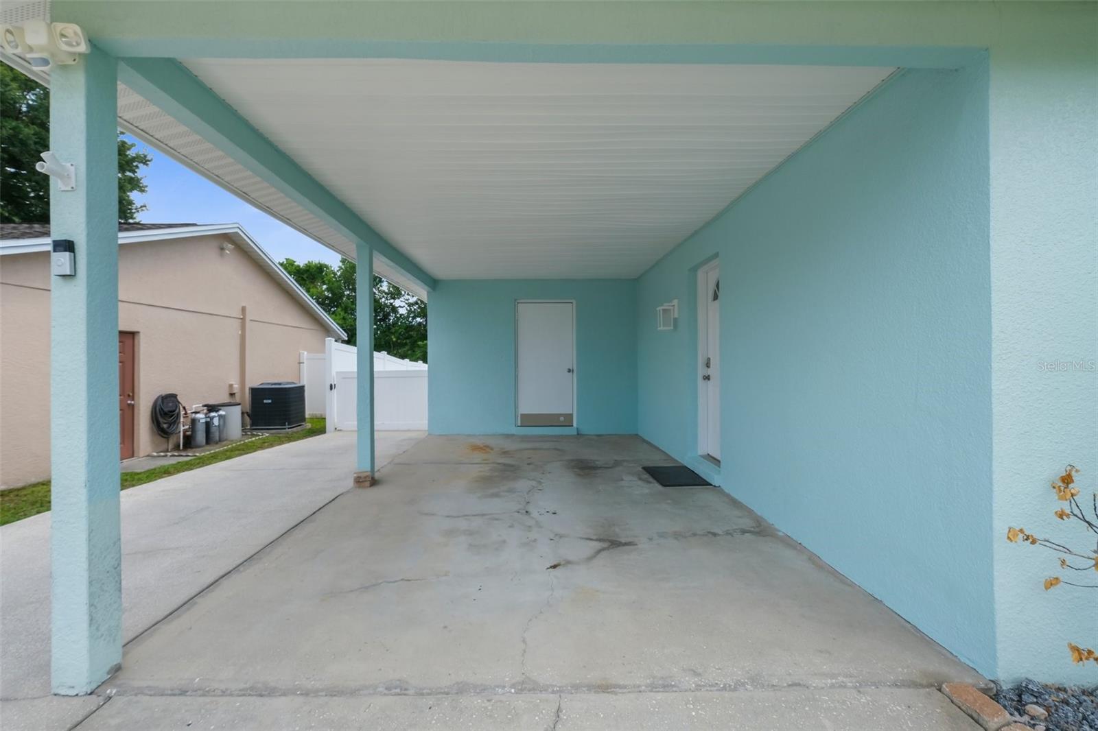 Large covered carport area!