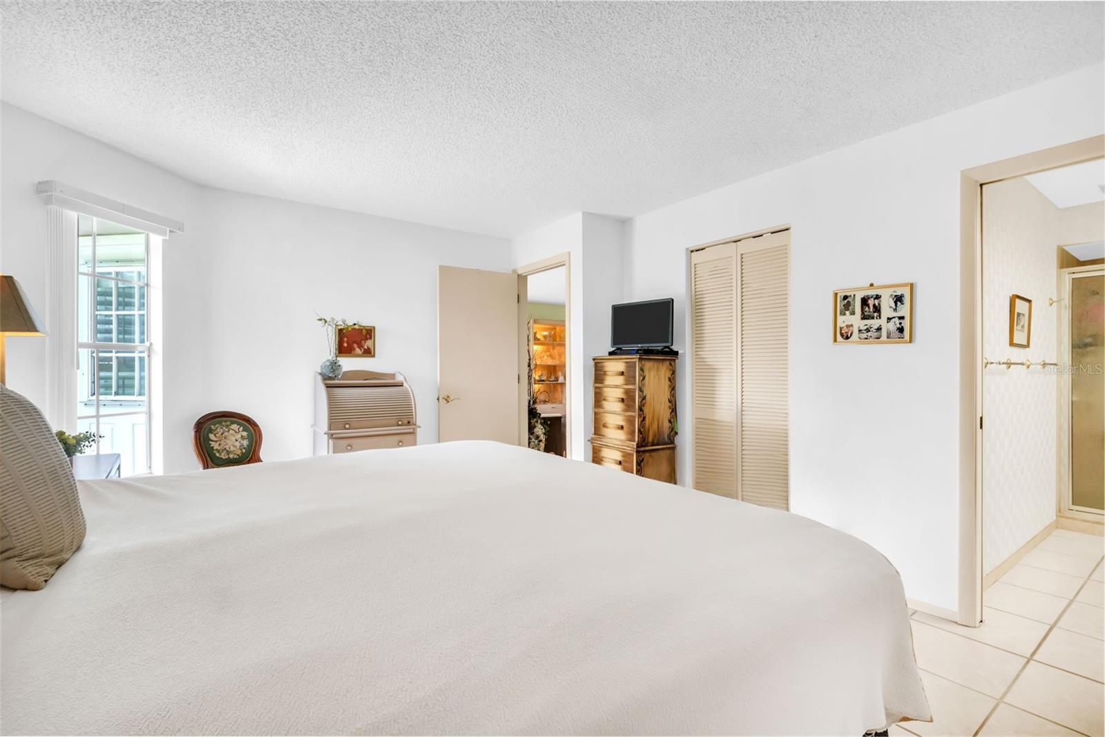 Private en-suite bath with walk-in shower & large walk-in closet~