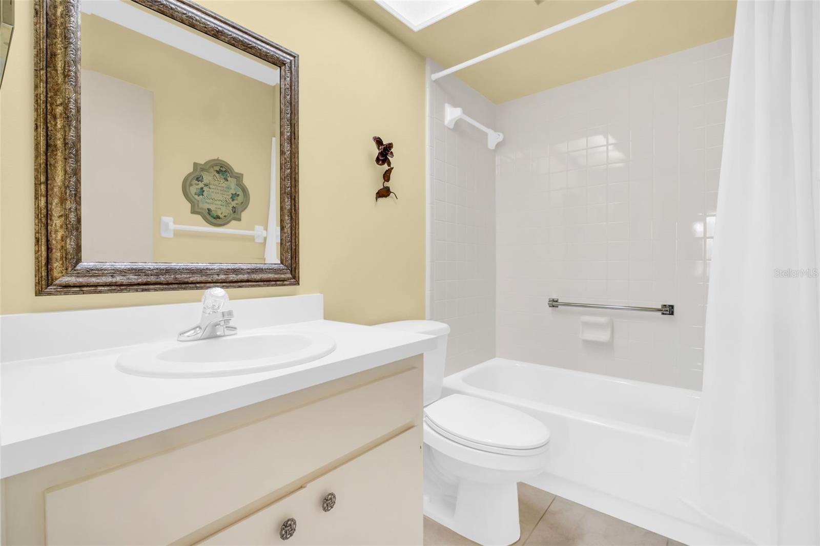 Hall bath with tub/shower combo~
