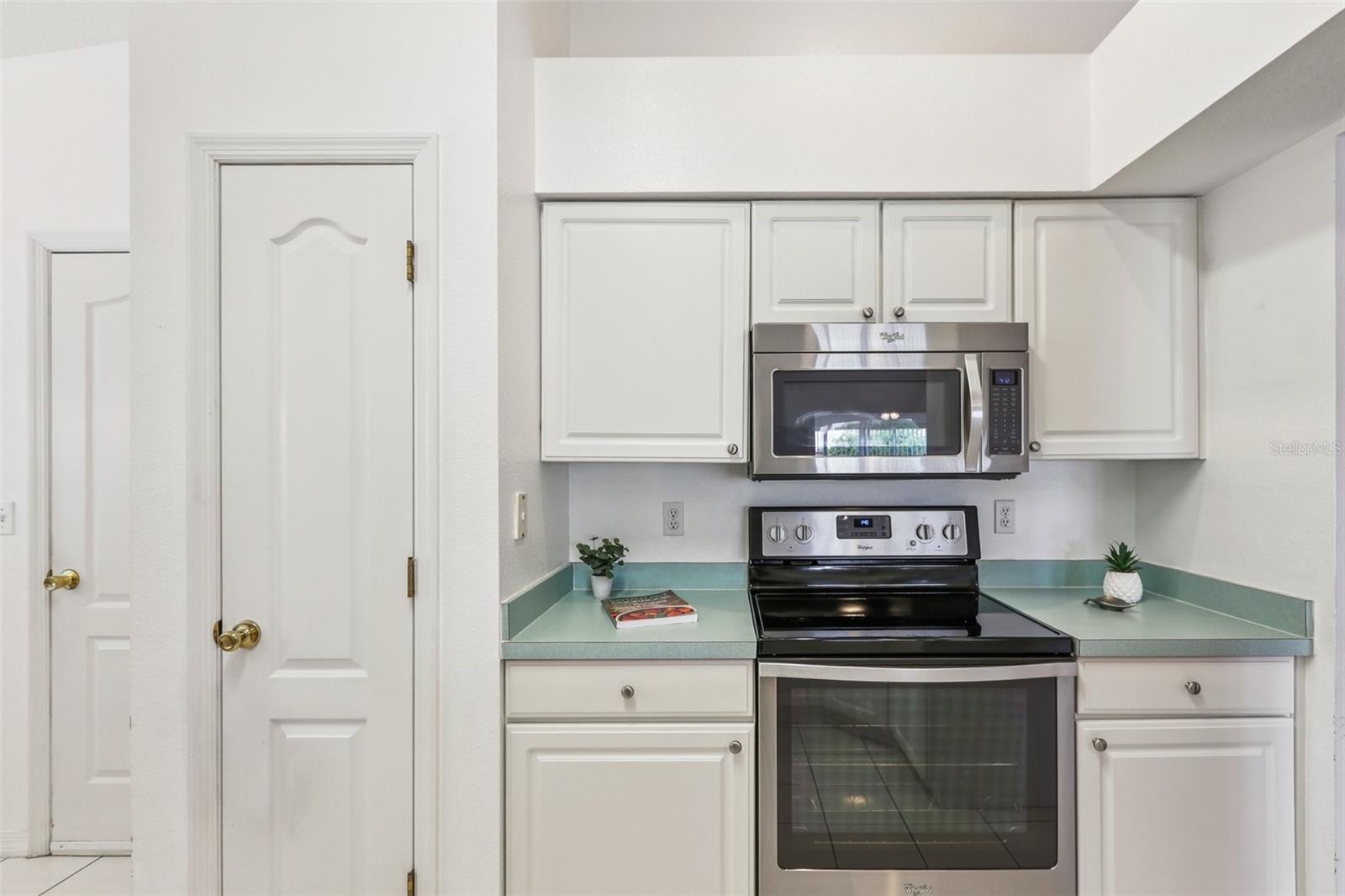One of two pantries, electric range, microwave