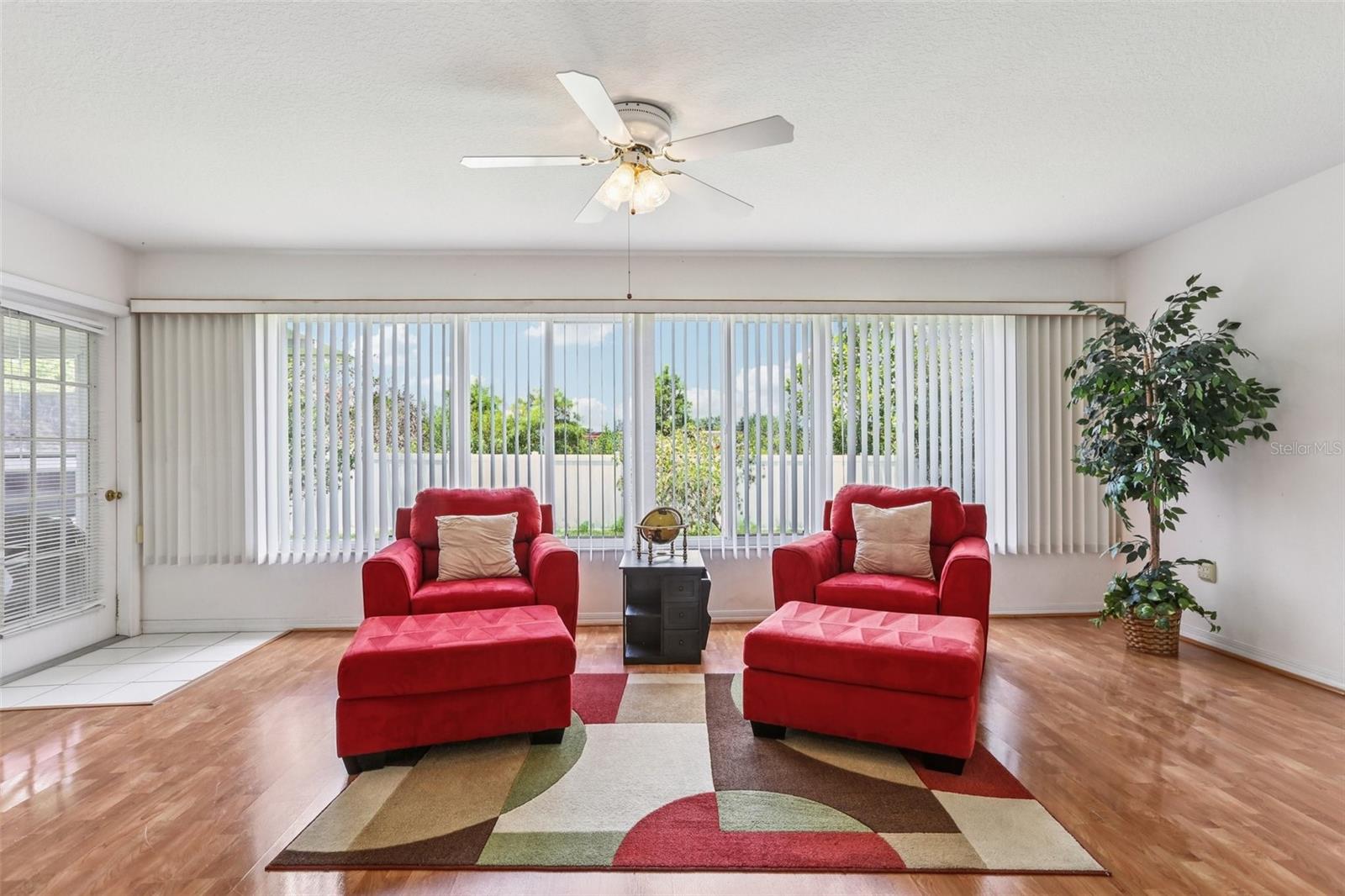 Large Florida room was a builder upgrade. Door to the left leads to screened lanai.