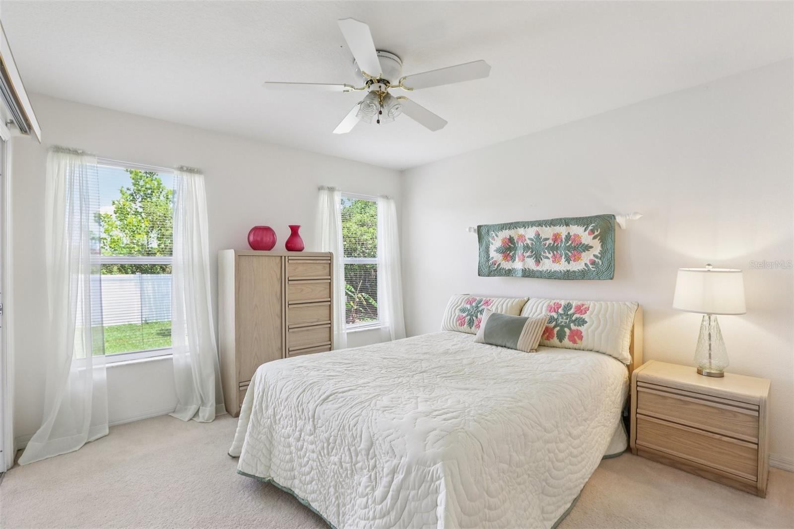Secondary bedroom has room for queen size bed, nightstand and dresser