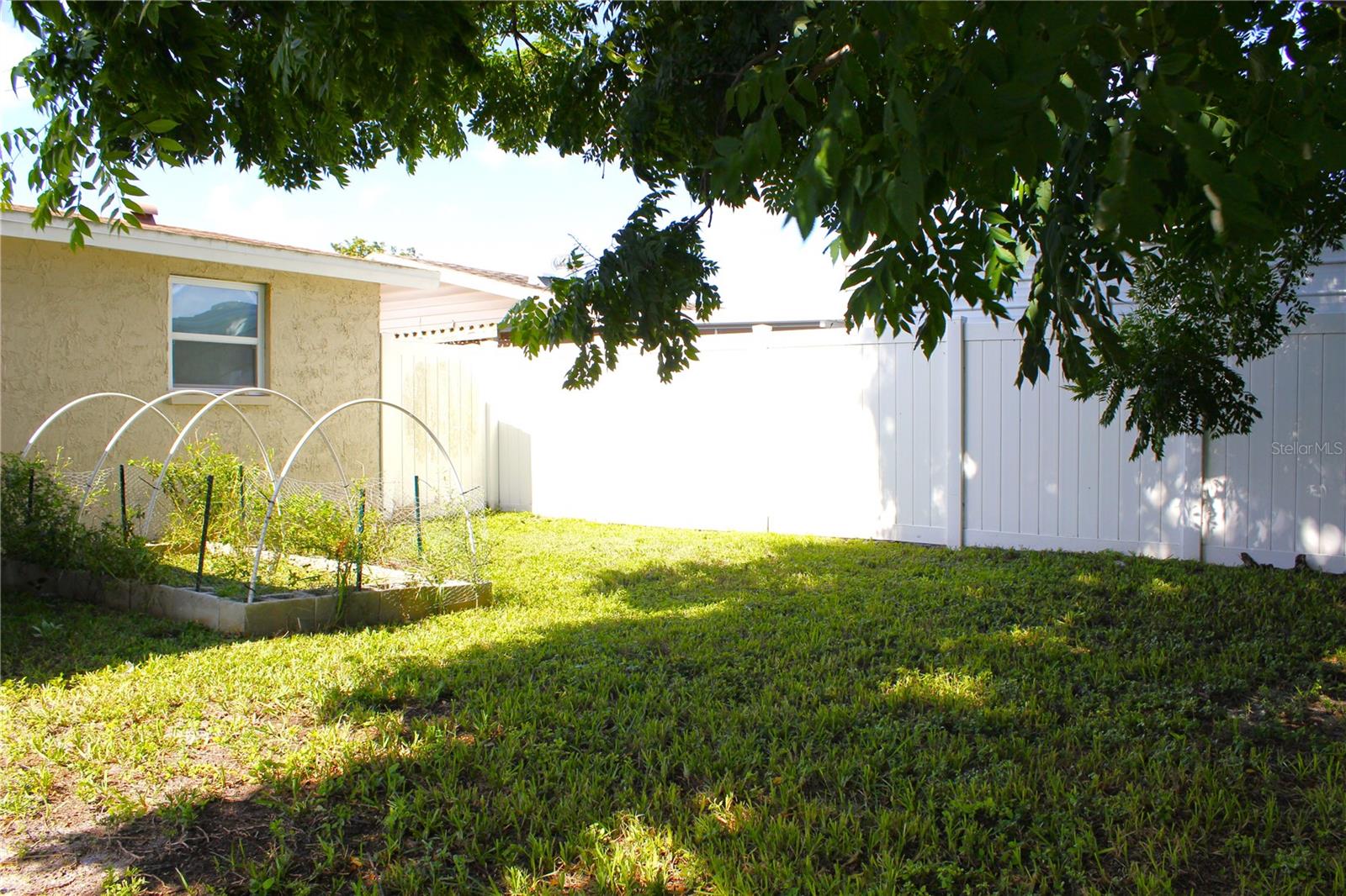 FENCED BACK YARD