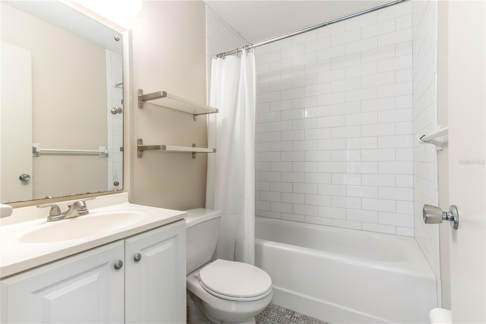 Light and bright with new toilet.
