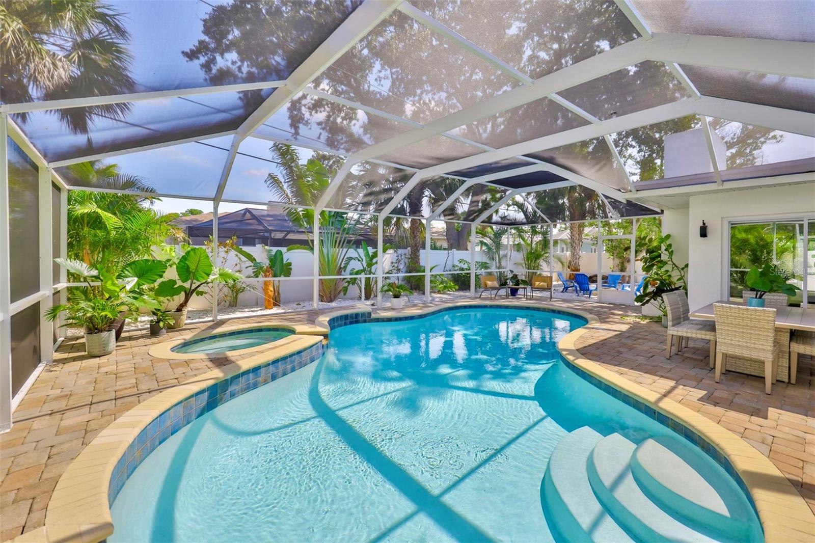 Stunning pool with small cocktail pool for seating.