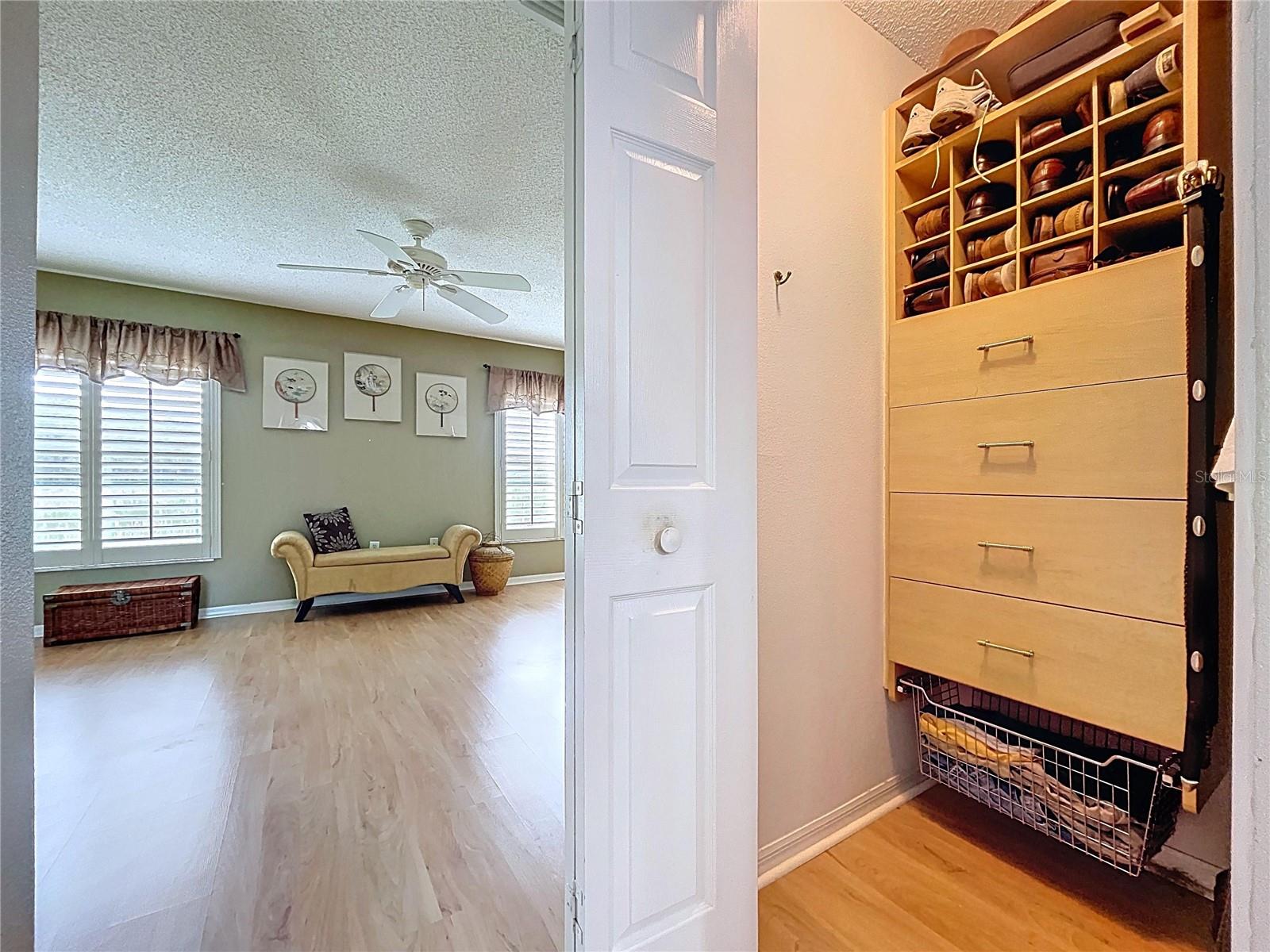 Built-in shelving in one closet