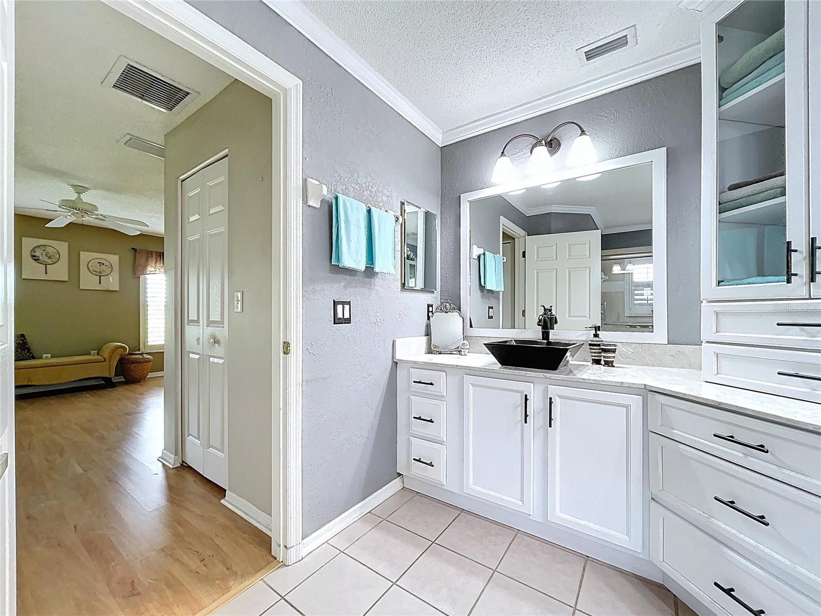 Master bath adjacent to closet area