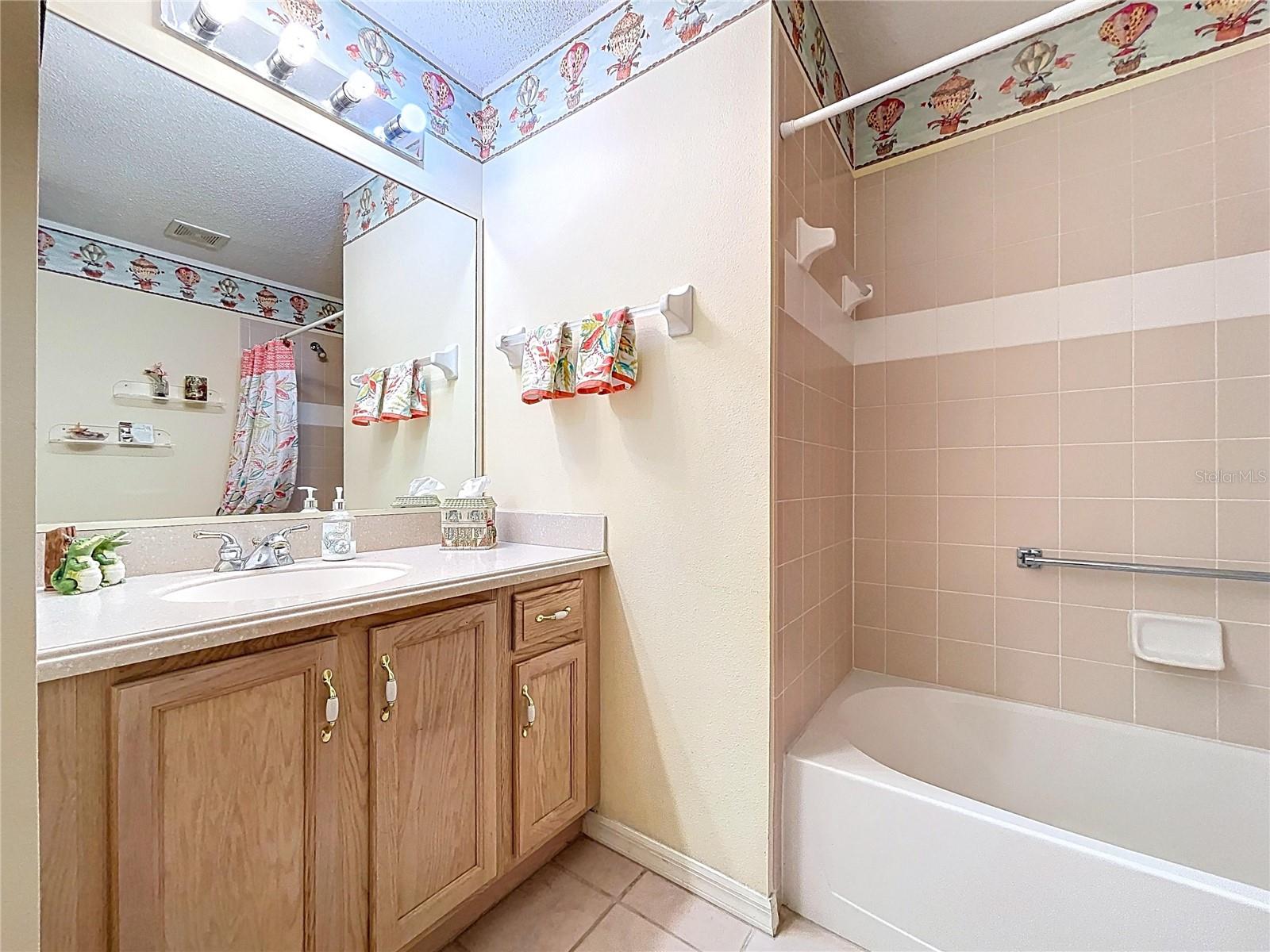 Second bath adjacent to bedroom