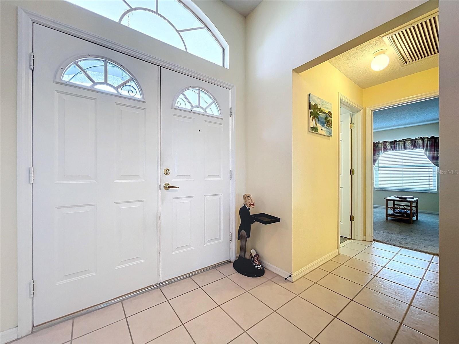 Double doors into foyer
