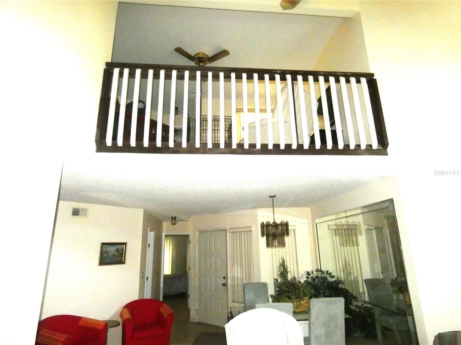 View of upstairs, so many options to make this Loft area your family room, craft room, game room or office.