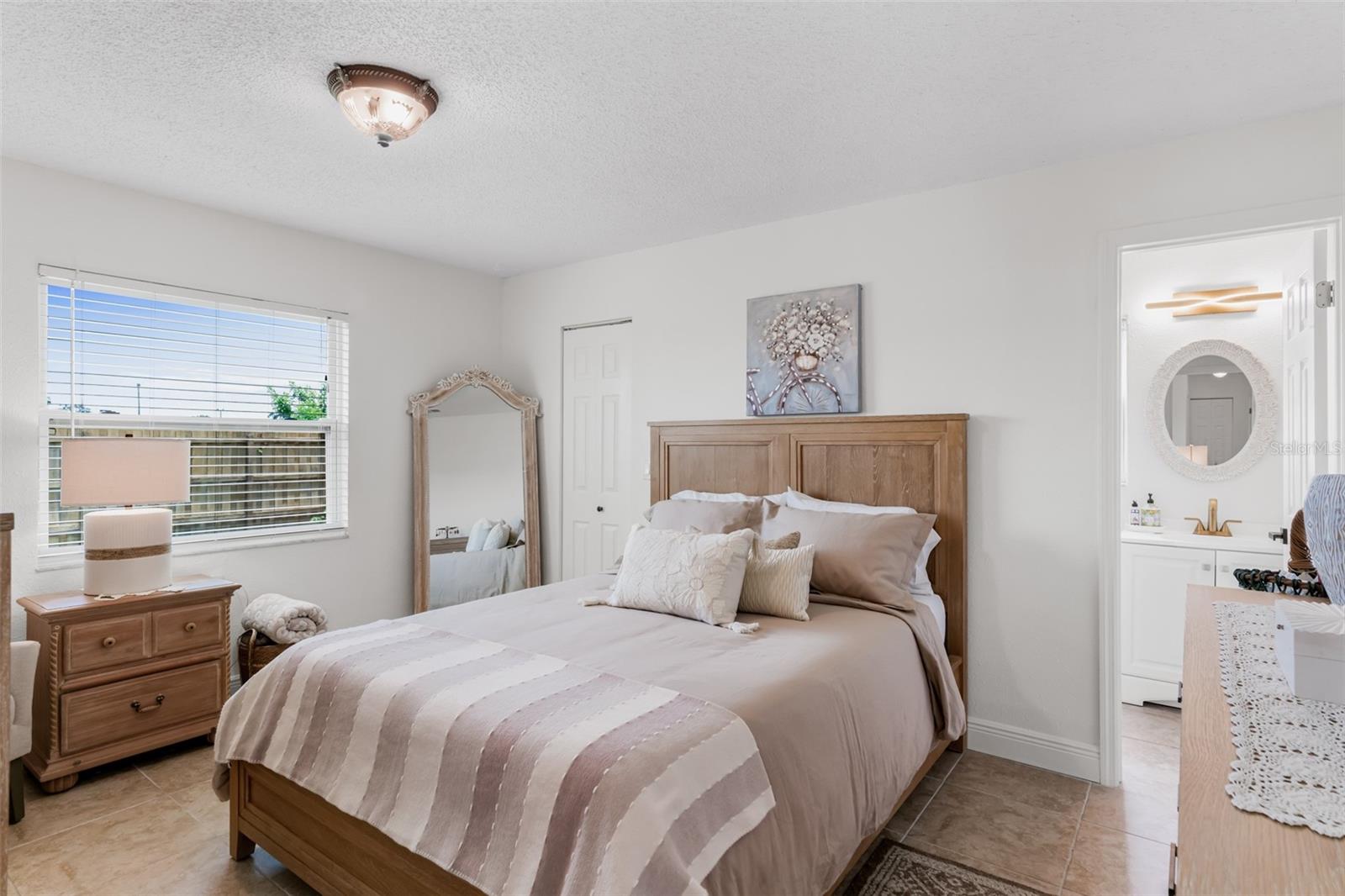 Primary bedroom with ensuite bathroom